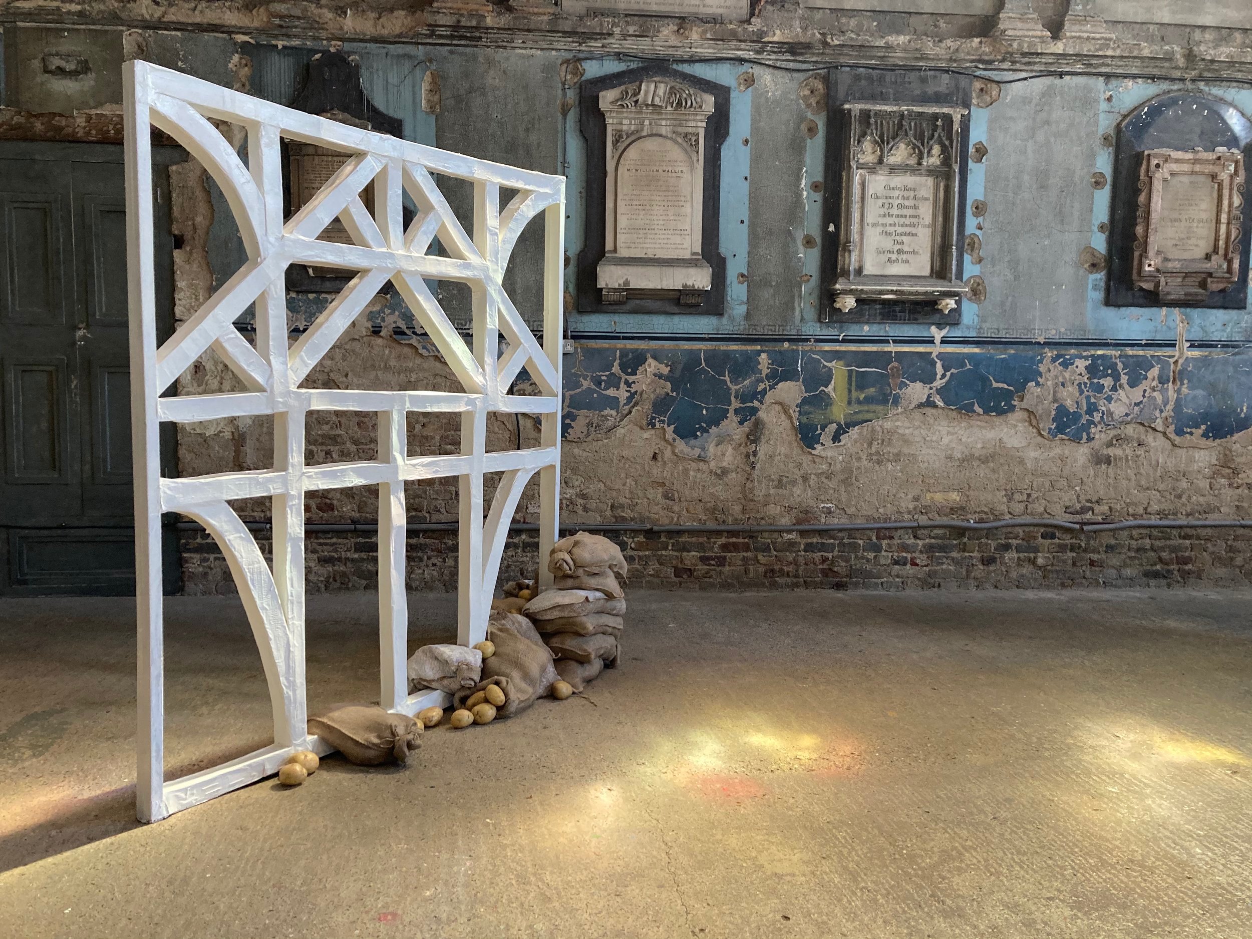Grange, 2021 (cardboard, paper, paint, hessian, potatoes)
