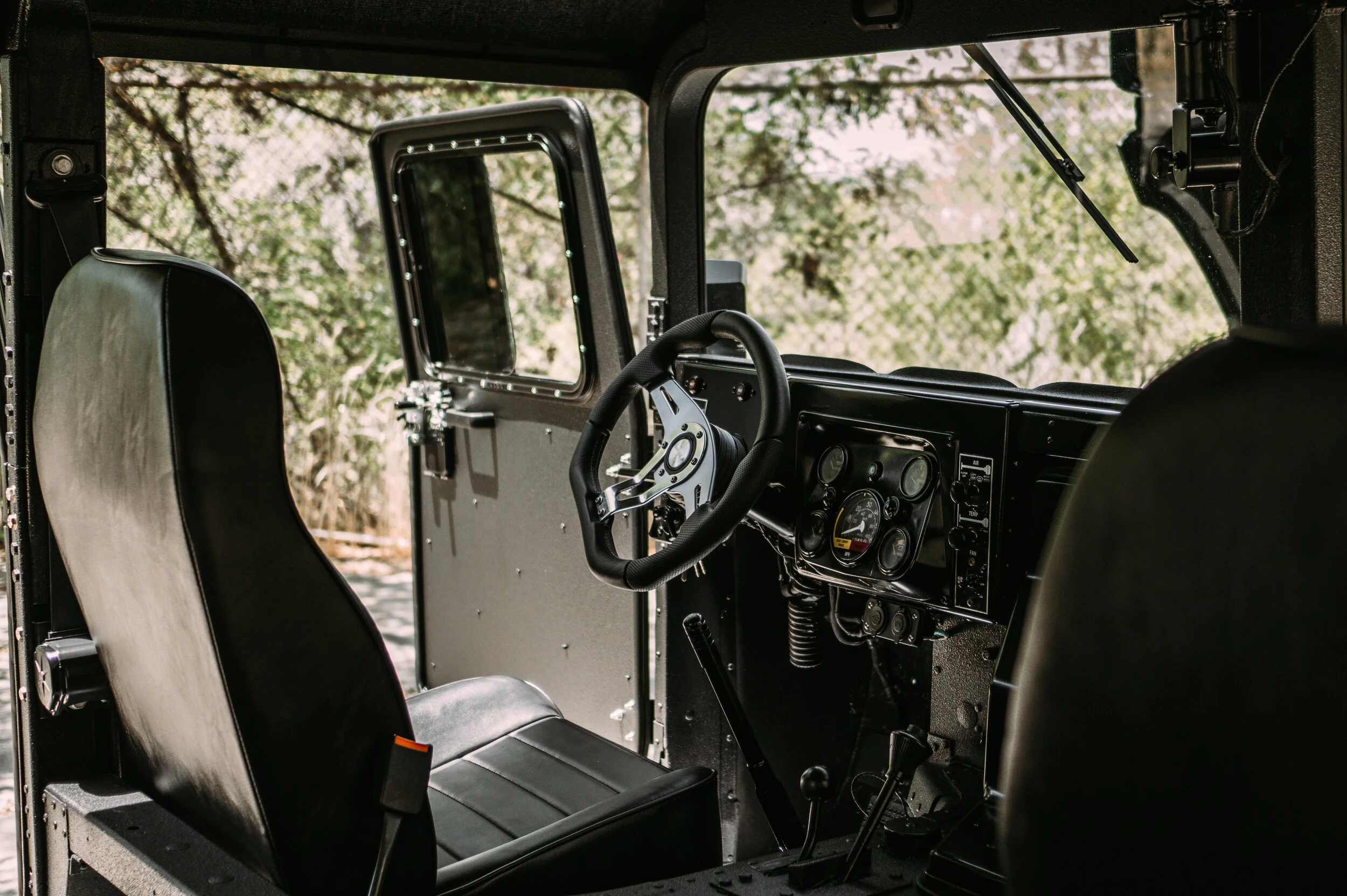 Raider+ Interior with optional Performance Steering Wheel.