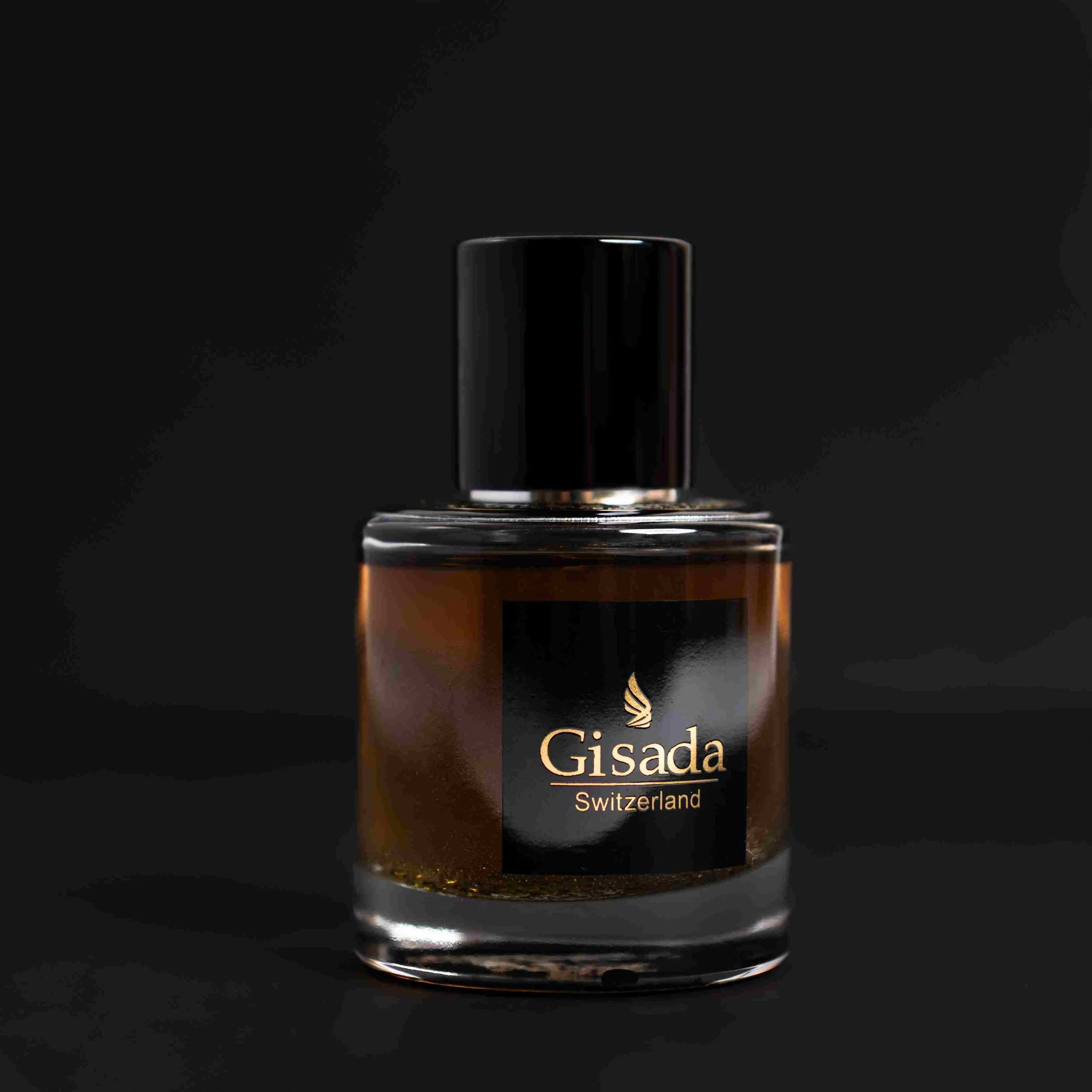 Gisada Switzerland perfume bottle upright on dark backdrop