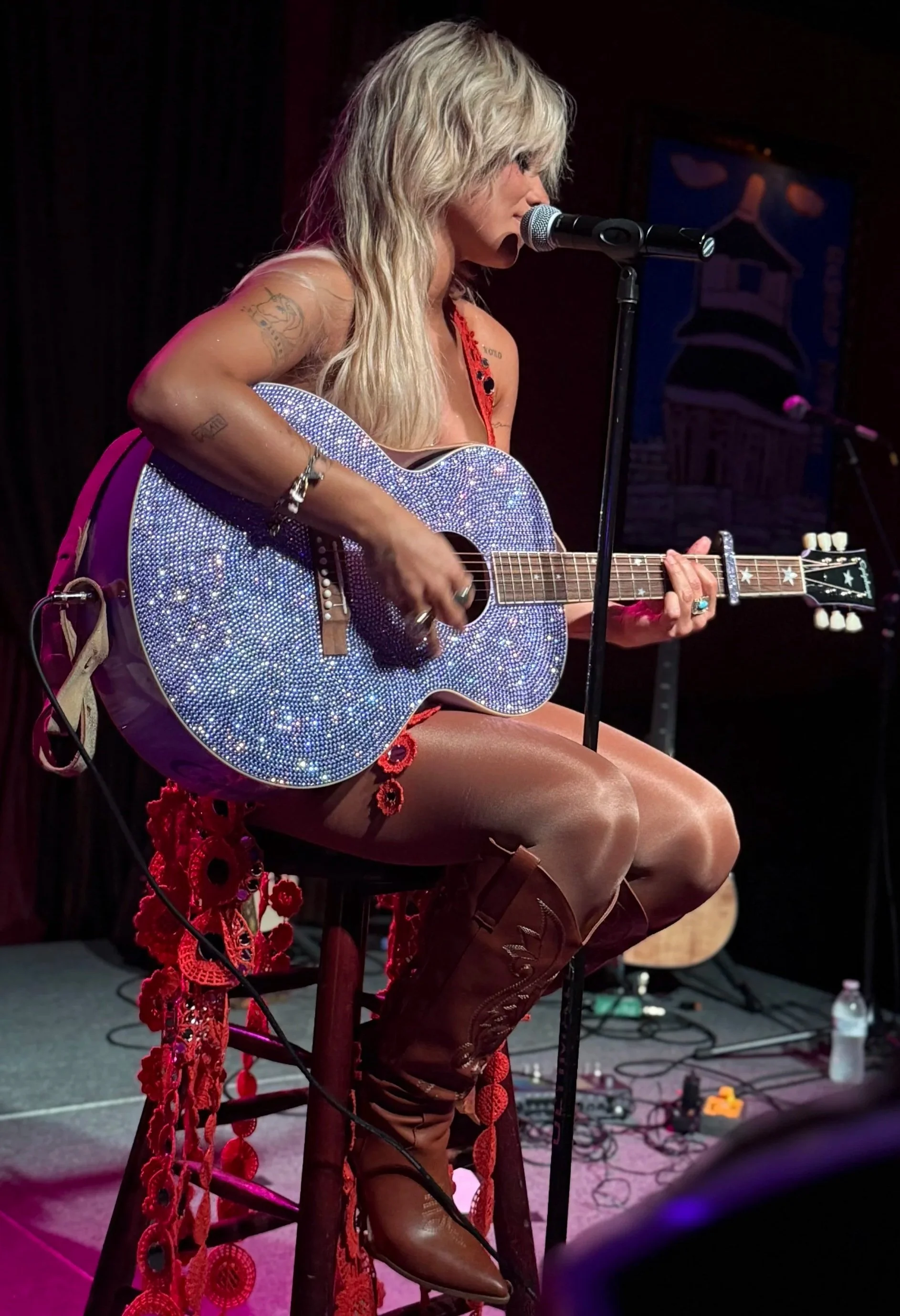 tanner adell playing guitar