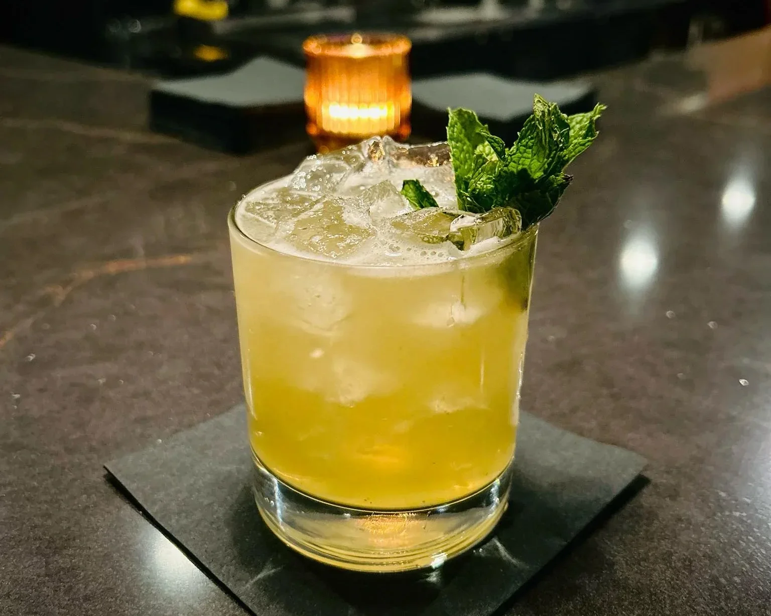  COCKTAILS (as of May 2026) 
Umami Old Fashioned — Bourbon • Kuro Sato • Umami Bitters 
Pineapple Margarita** — Tequila Blanco • Pineapple Juice • Triple Sec • Thai Chili Shrub 
Lemon Fizz — Limoncello • Soju • Yuzu Seltzer • Soju: Blueberry, Strawbe