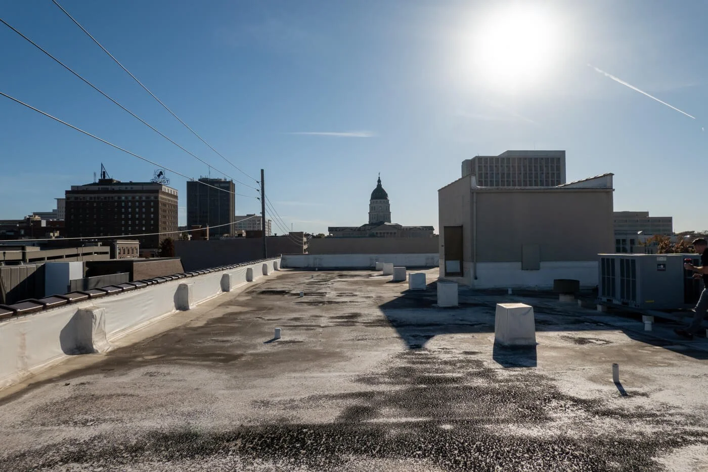 Old PVC roof system with lots of algae and organic buildup