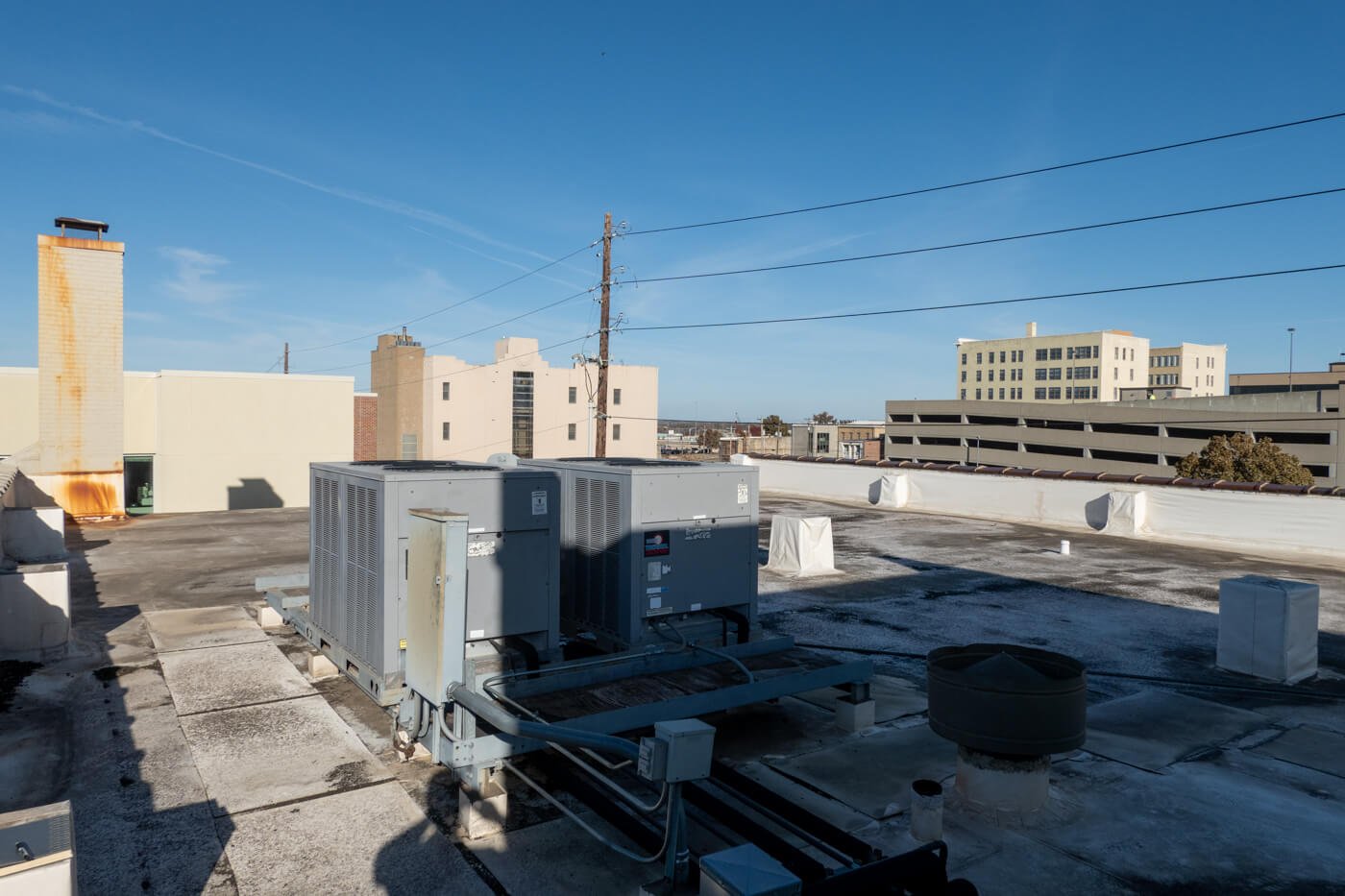 HVAC units on old pvc roof, needing replacement