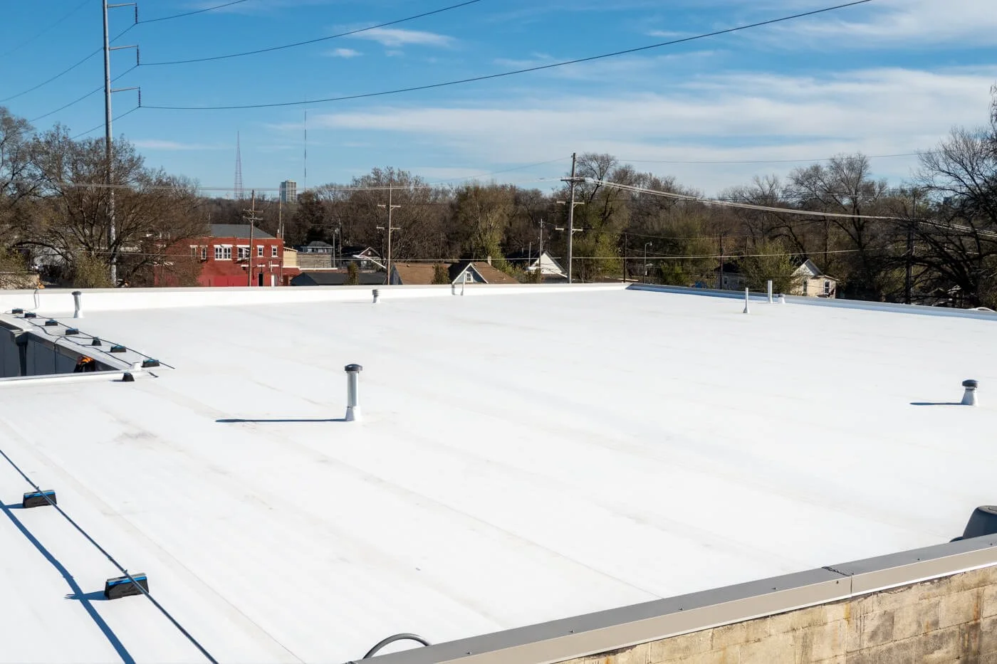Overview of white TPO industrial roof system installed by MAC Street Industrial