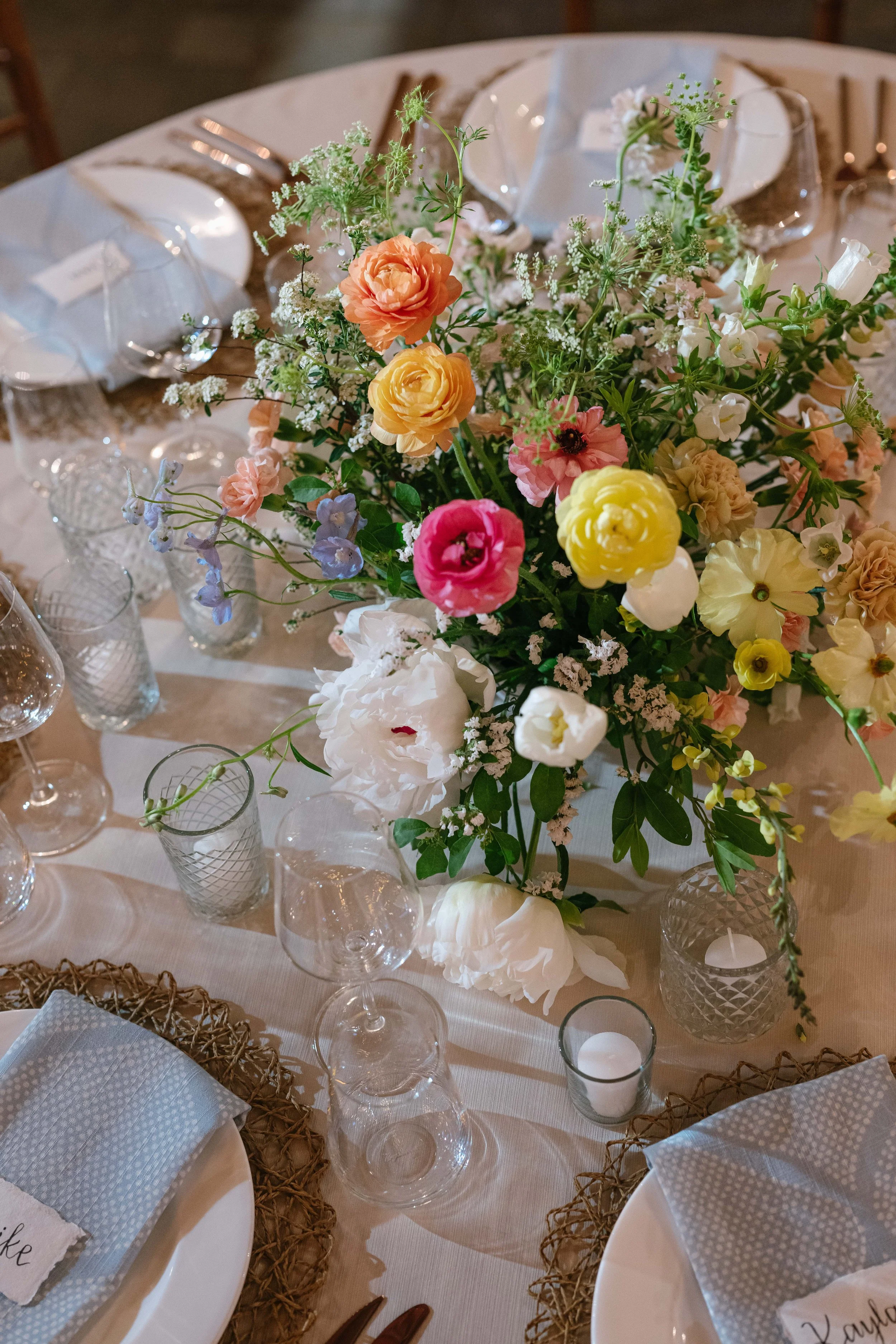 Spring floral wedding arrangement Charlottesville florist ranunculus 