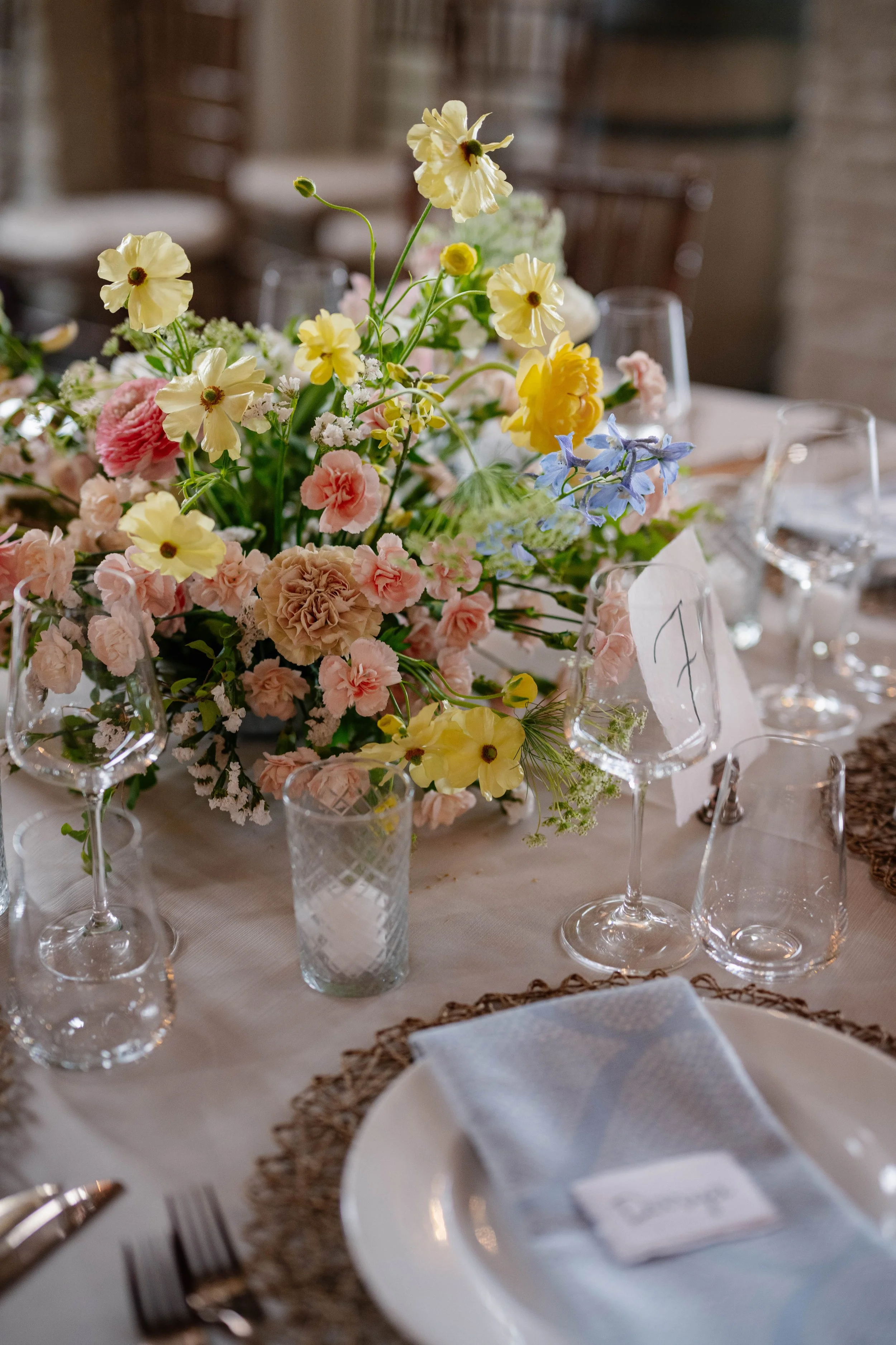 Spring floral wedding arrangement Charlottesville florist ranunculus 