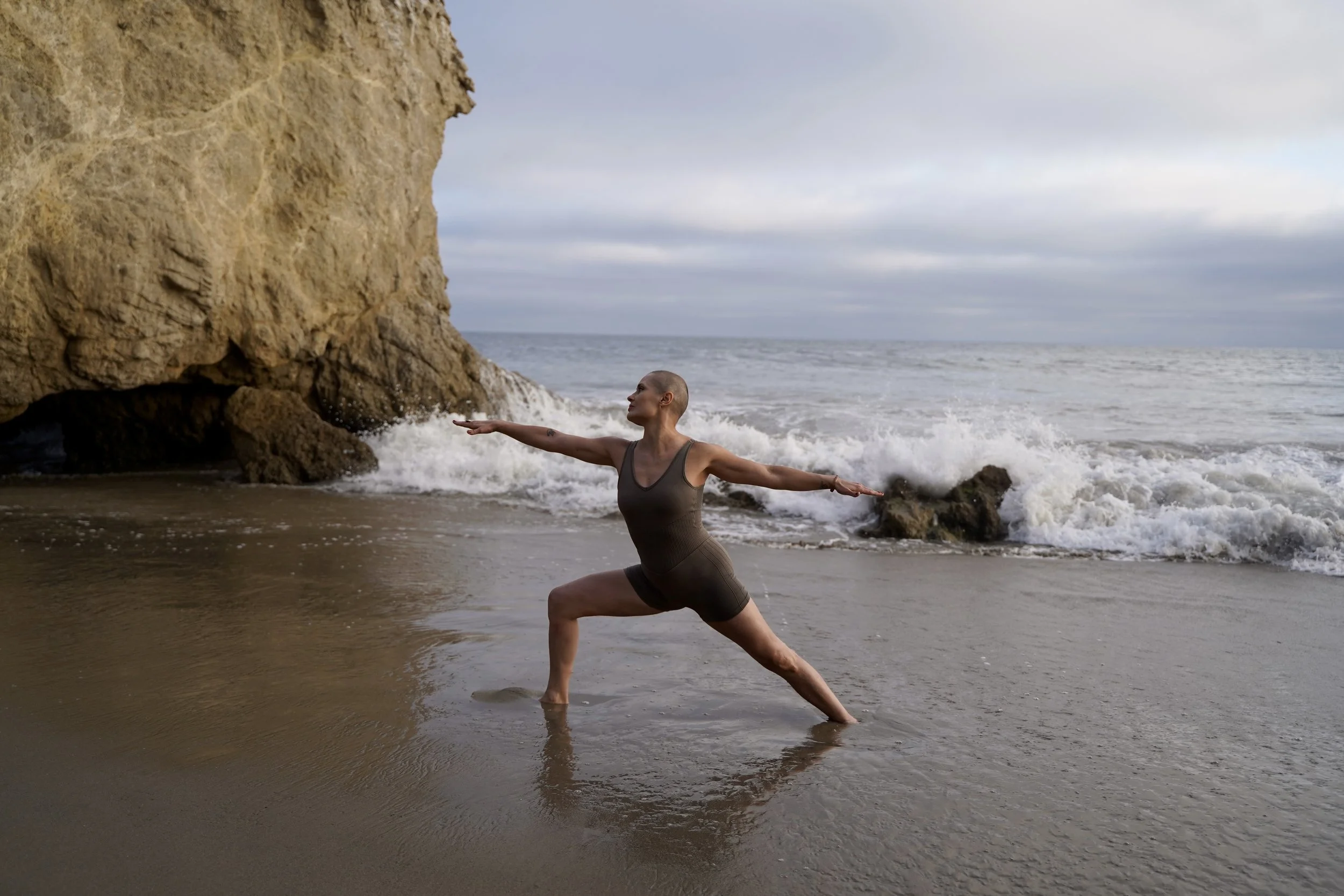 Sandy Duarte teaching a yoga class focused on mindful movement, flexibility, balance, and stress reduction.