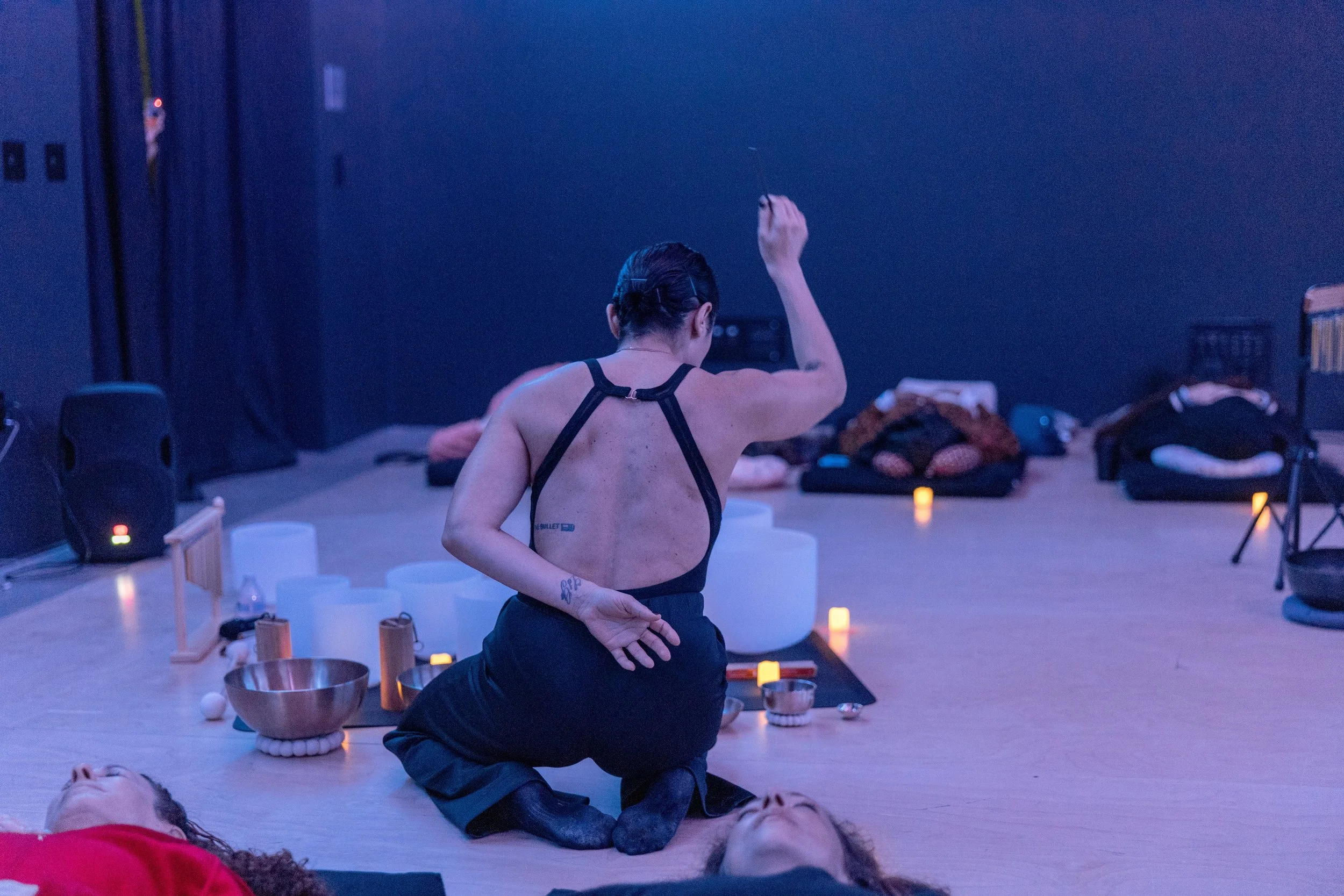 Sandy Duarte leading a Sonic Unity sound bath at The Wende Museum in Los Angeles during immersive art and meditation event.