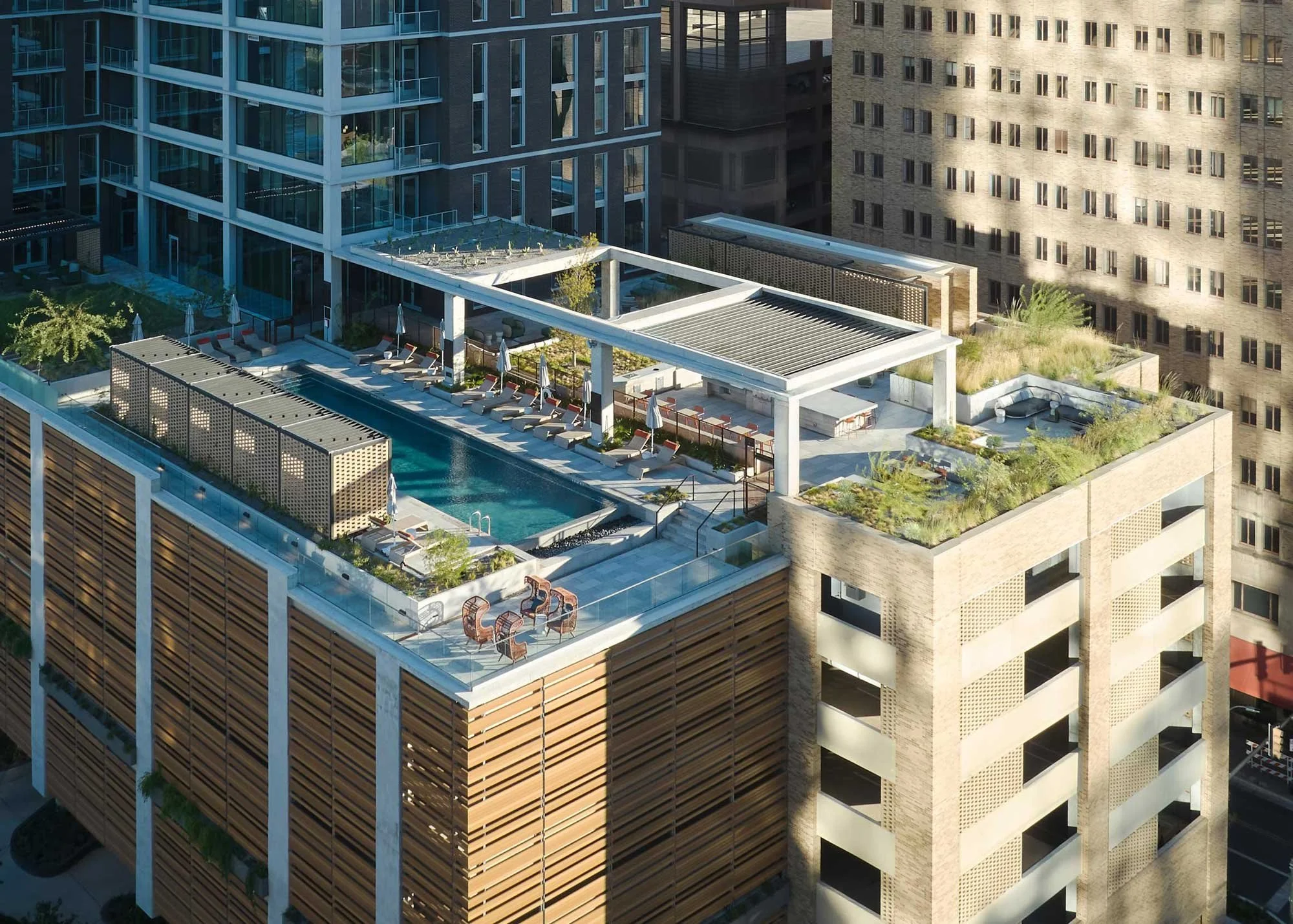 Aerial view of 300 Main — high-rise building and surrounding downtown area with nearby streets and rooftops.