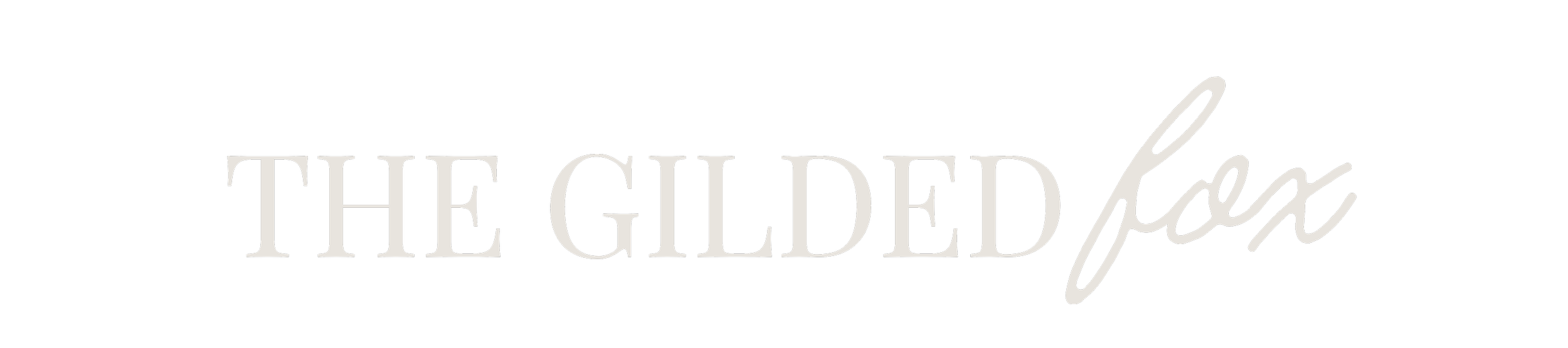 The text 'The Gilded Fox' in gray and white on a black background