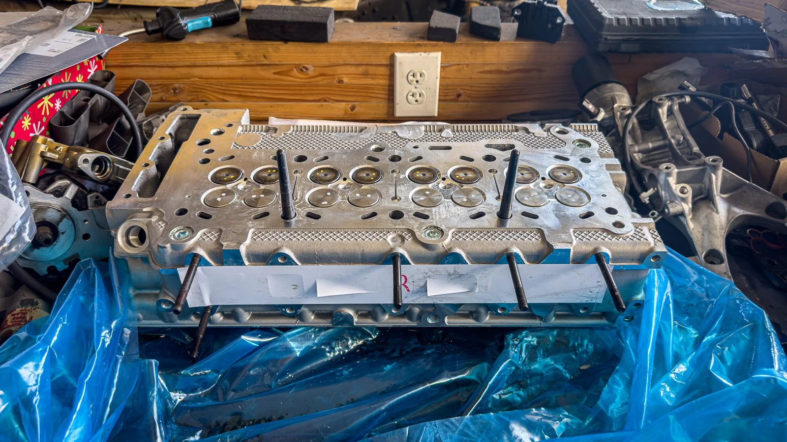 Paradise Lost: The new head for the engine has finally arrived! This was the last major part needed before the engine could be reassembled. But wait&mdash;there&rsquo;s another issue. And yes, all of this was supposed to be in stock before I drove do