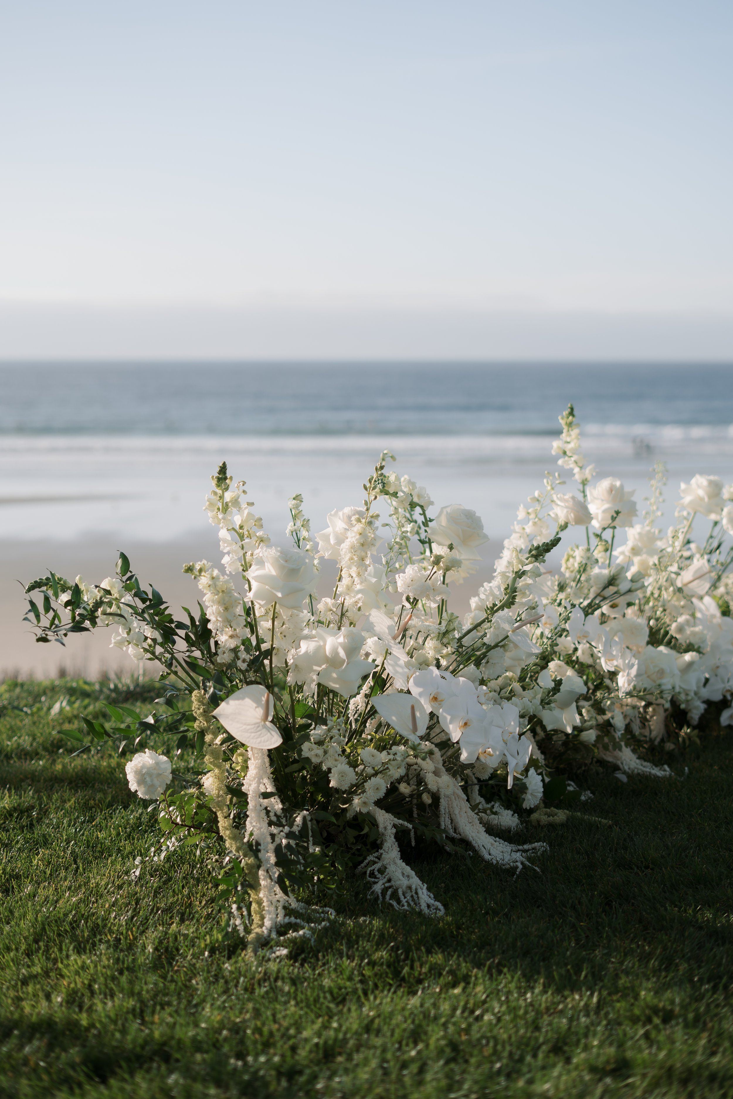 scripps-seaside-forum-san-diego-wedding-venue-ceremony.webp