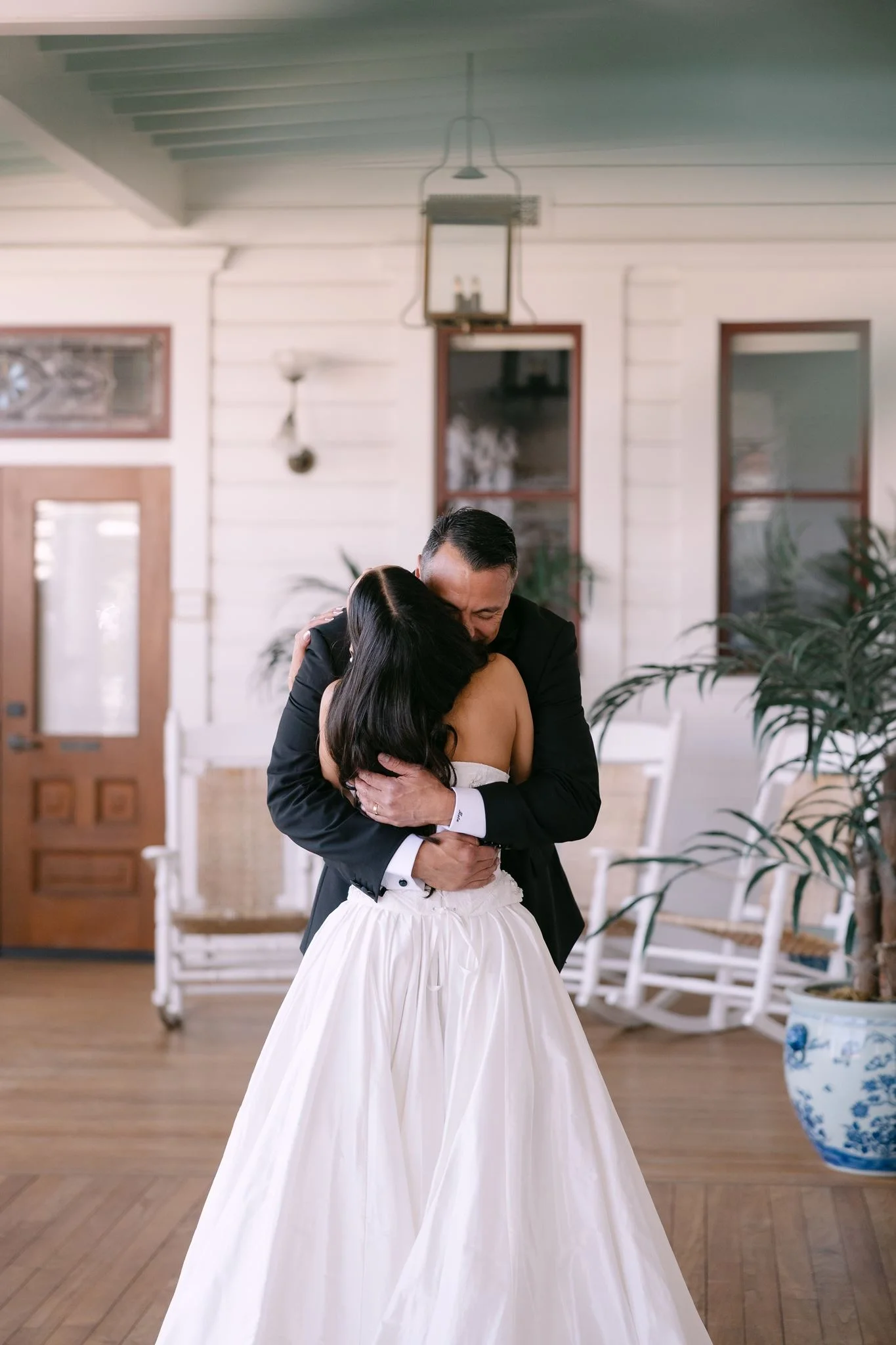 hotel-del-coronado-wedding-bride-father-embrace.webp