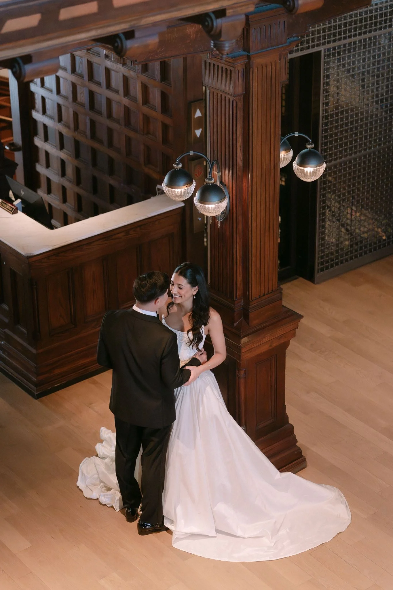 hotel-del-coronado-wedding-overhead-couple-portrait-historic-lobby.webp