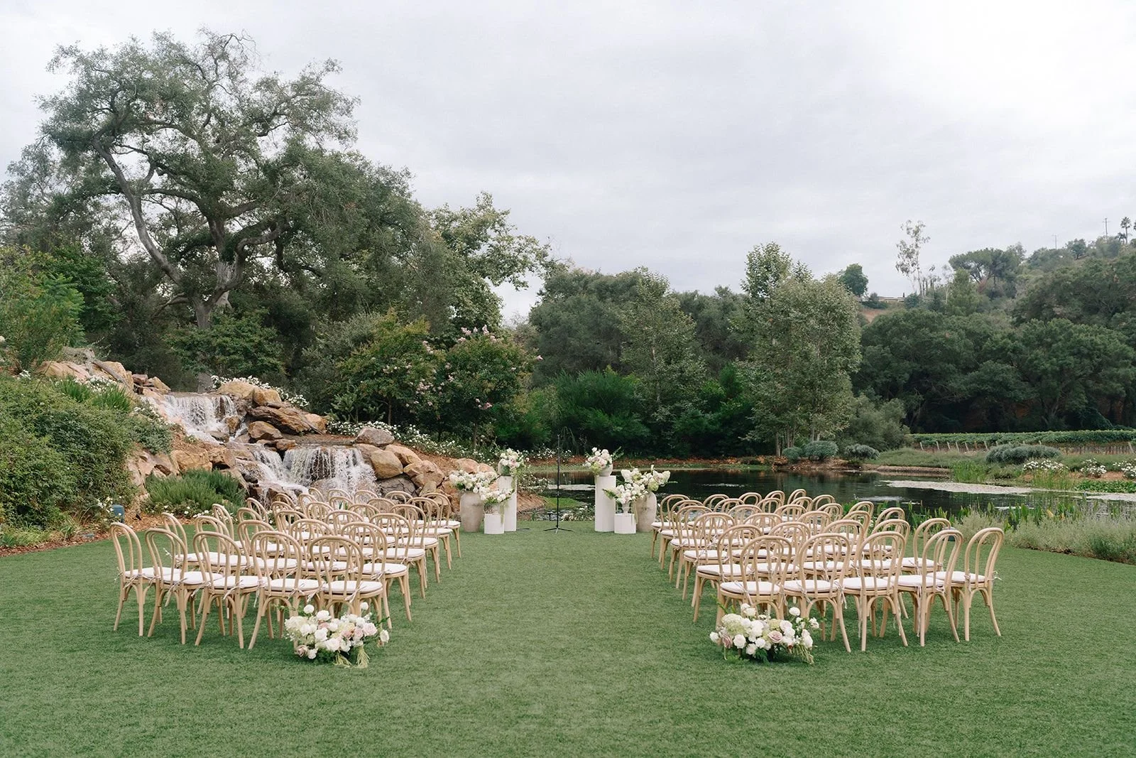 Outdoor wedding ceremony at Monserate Winery waterfall lawn