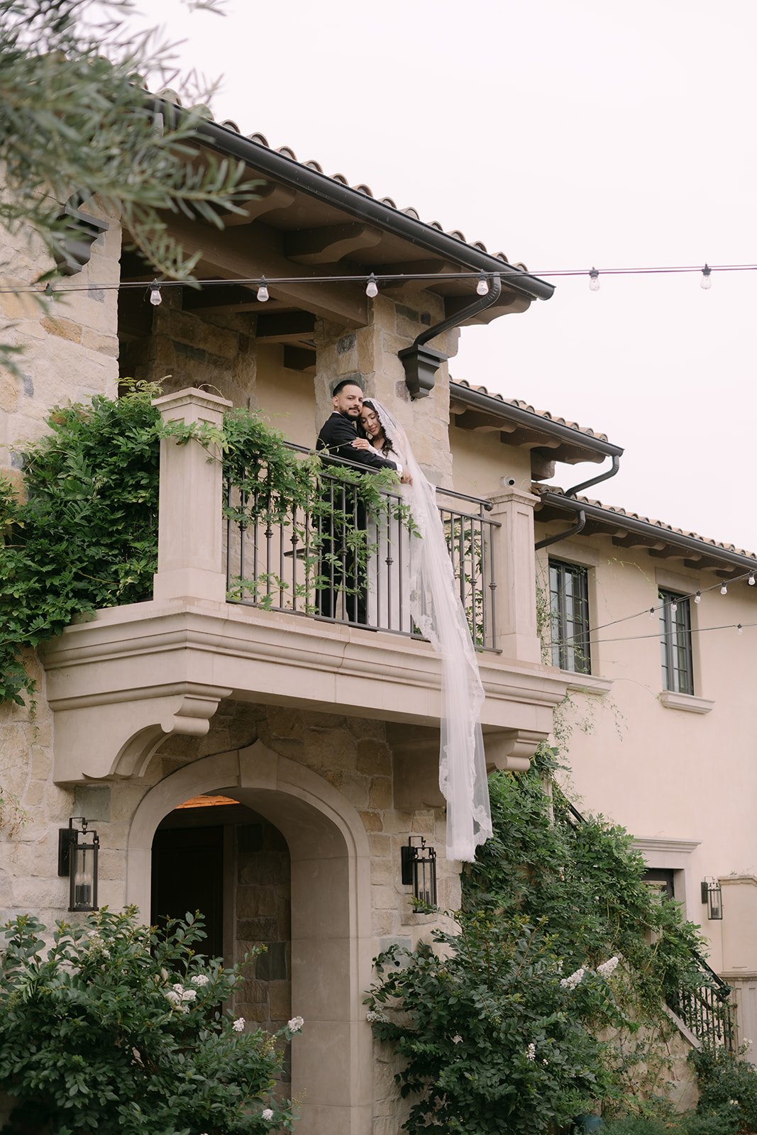 Romantic couple portrait on the balcony of the Tuscan Estate at Monserate Winery