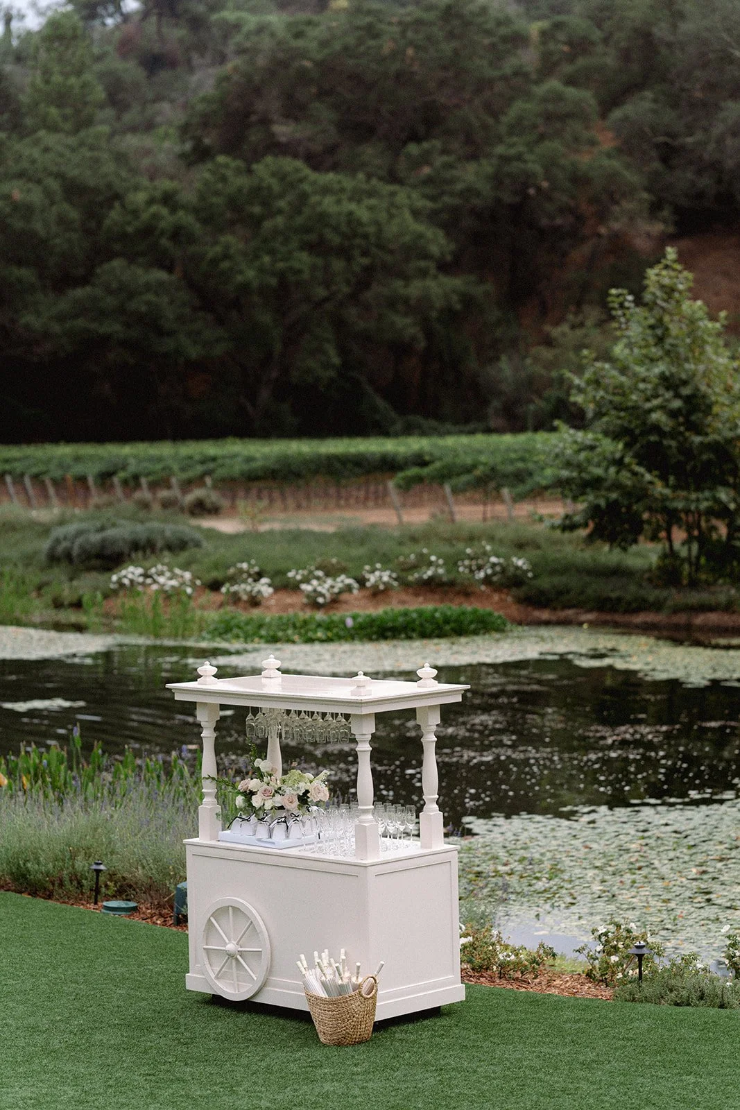 Champagne cart by the pond at a Monserate Winery wedding