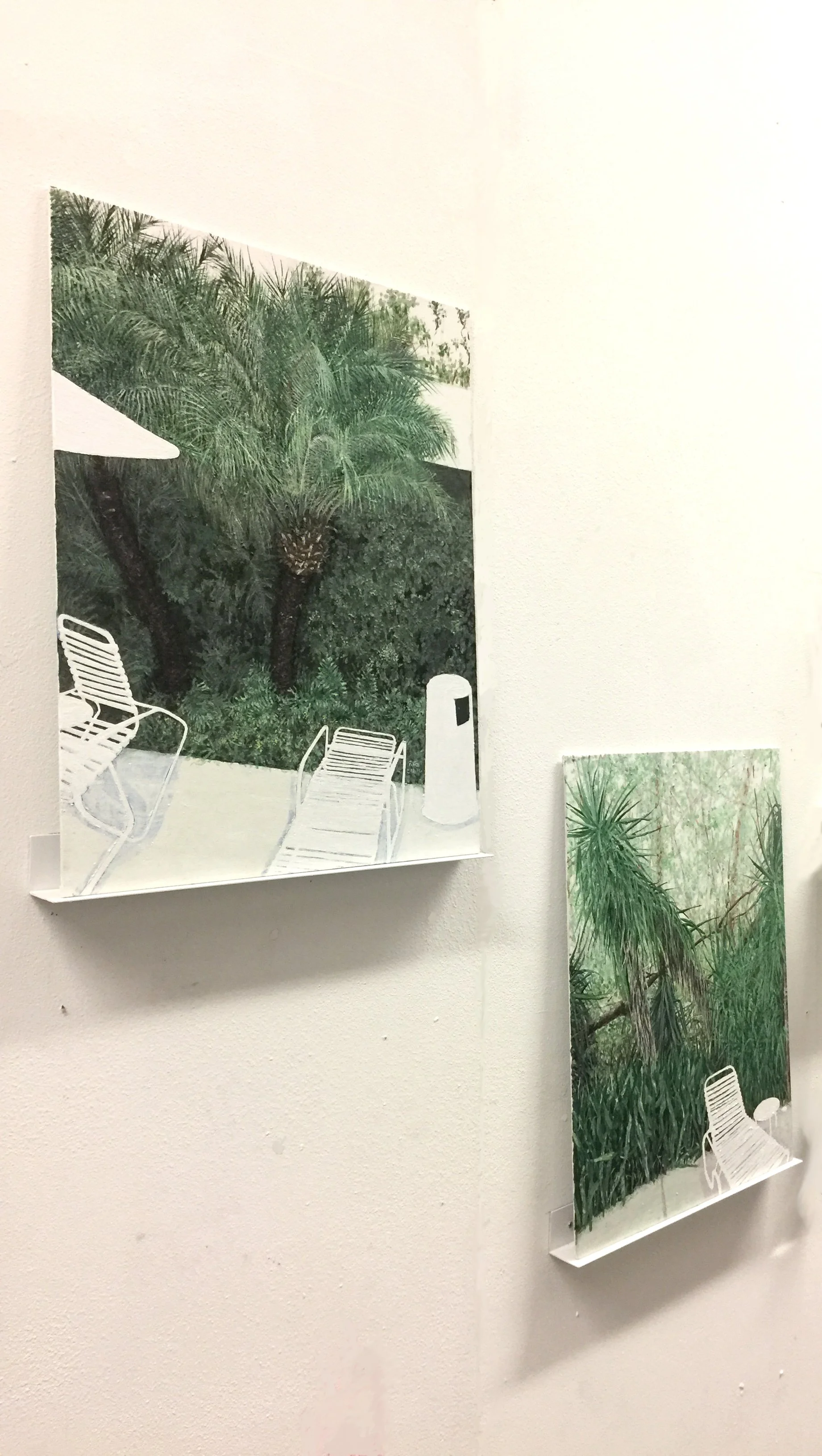 two small formats paintings ae hanging side by side. They are oil on canvas boards that sit on custom-made frames