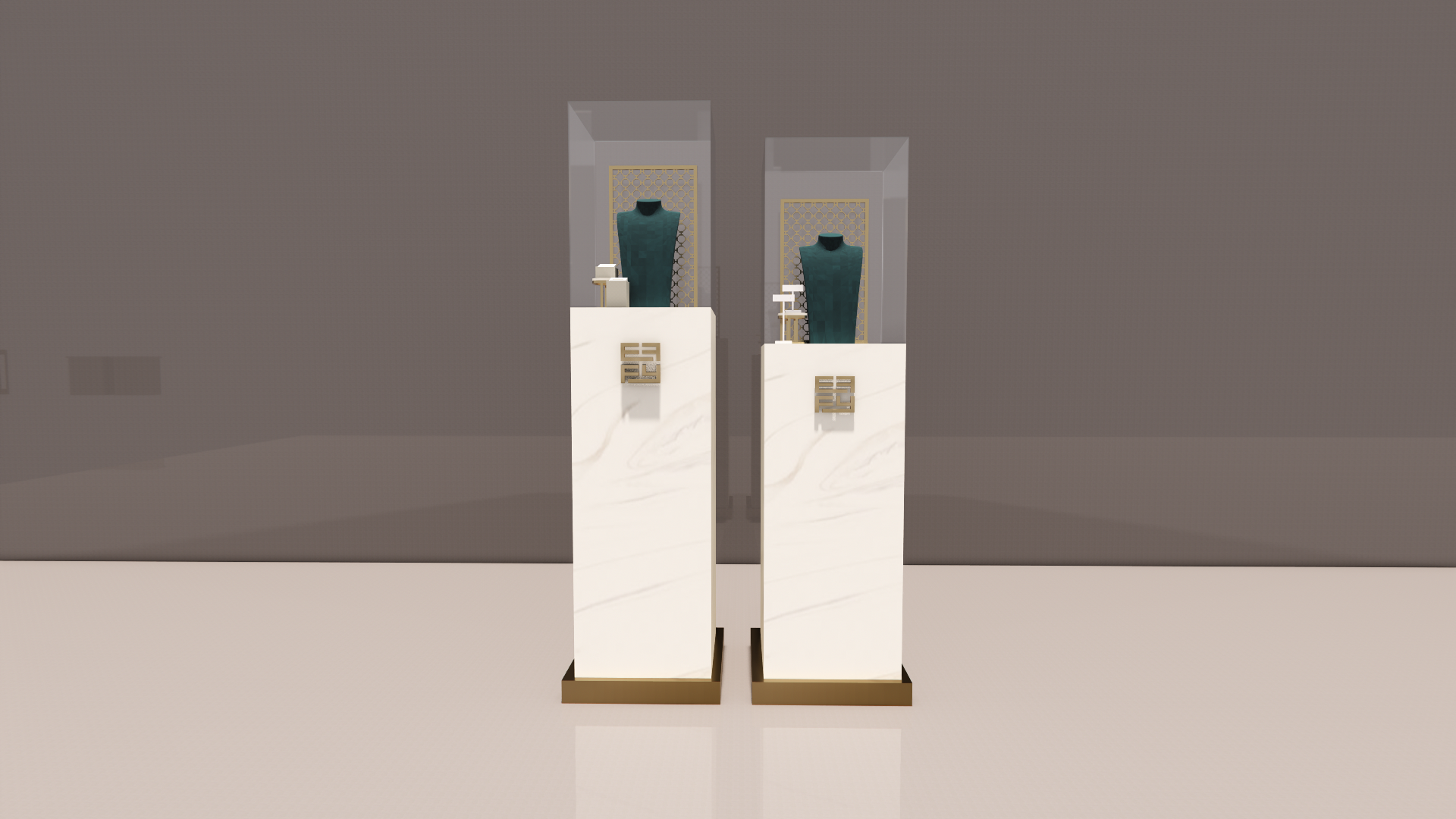 Display of two jewelry mannequins on white marble pedestals with gold accents, set against a gray background