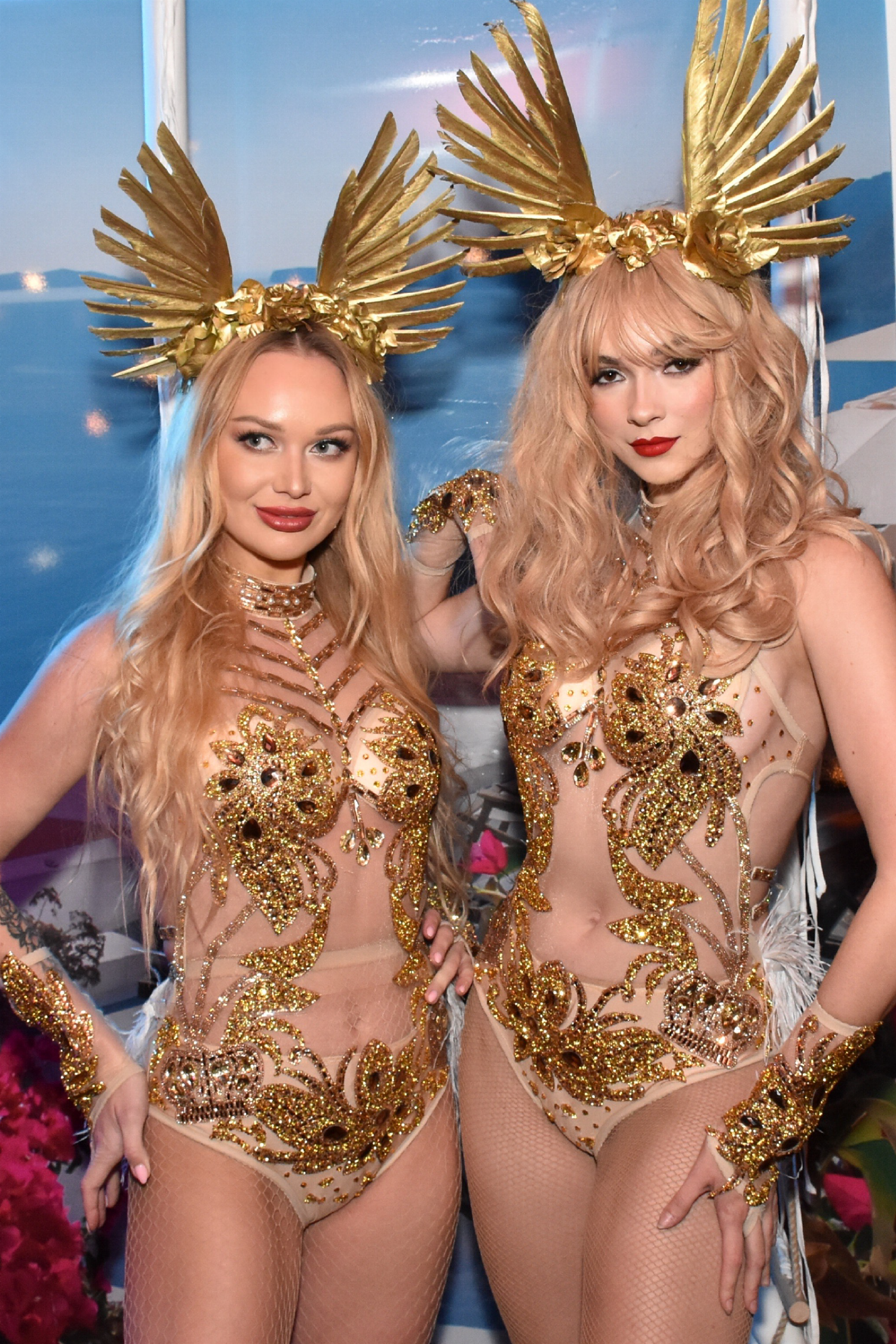 Showgirls posing at an event venue.