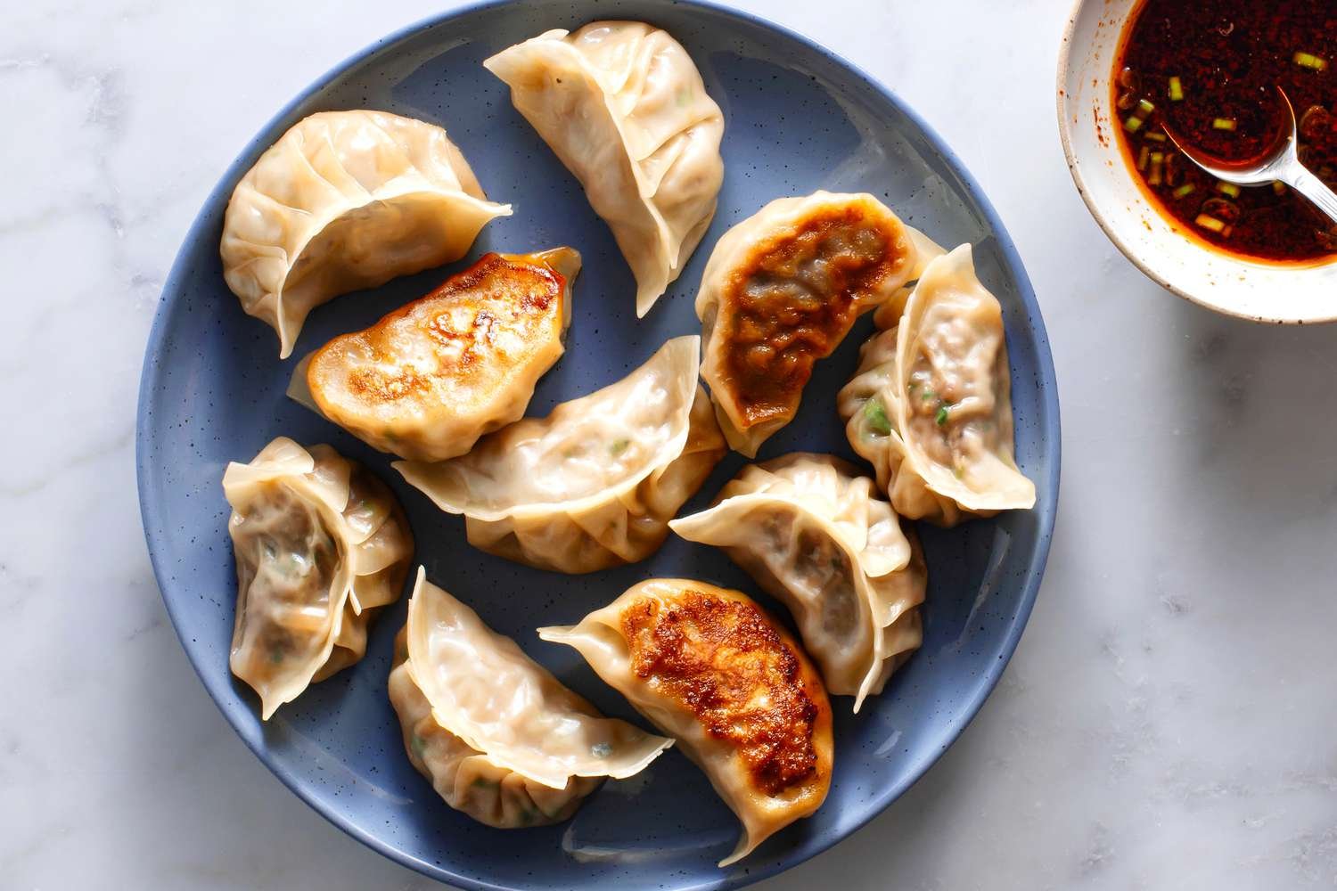 korean-dumpling-mandoo-2118676-hero-01-2e60dd10c6404f44ba00d6be80b63c0f.jpg