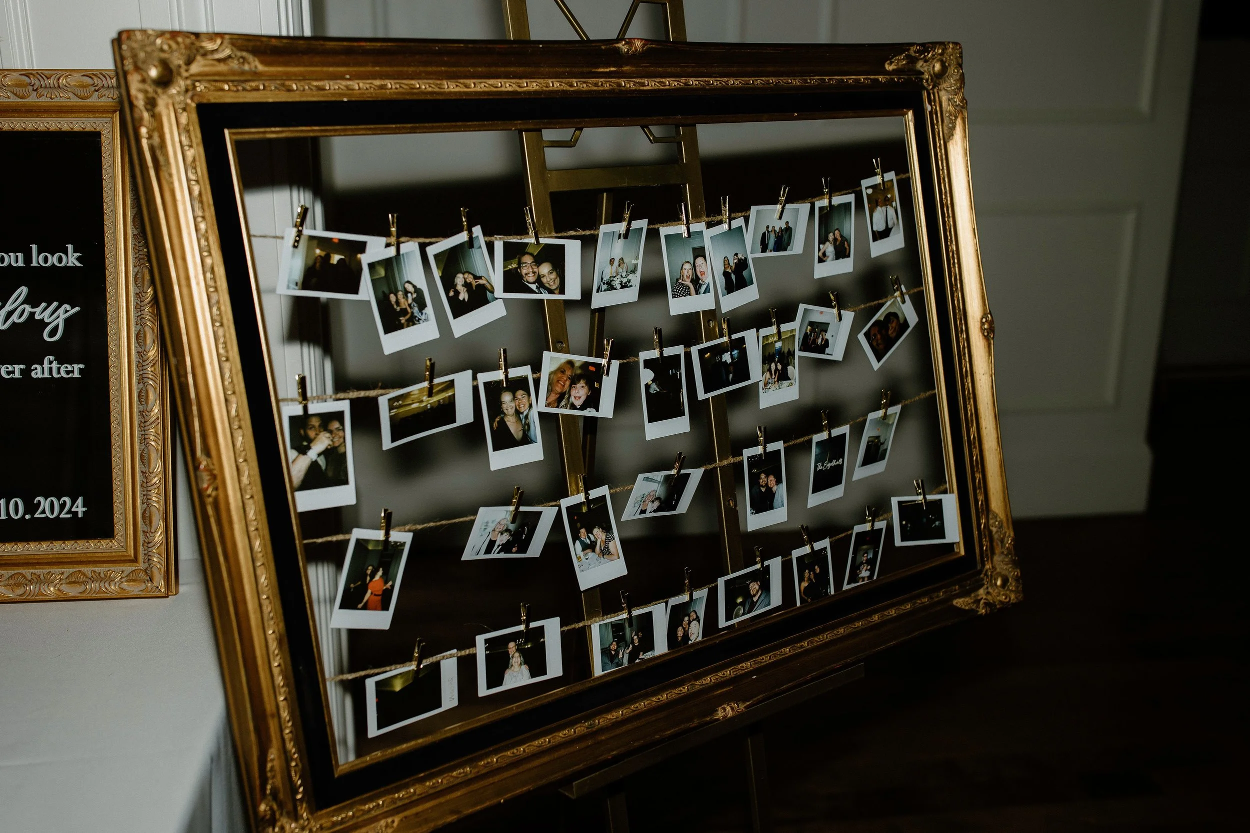 Polaroids of wedding guests displayed in a vintage gold heirloom frame at the afterparty — a creative Beam & Bramble detail capturing joyful, candid moments with timeless charm