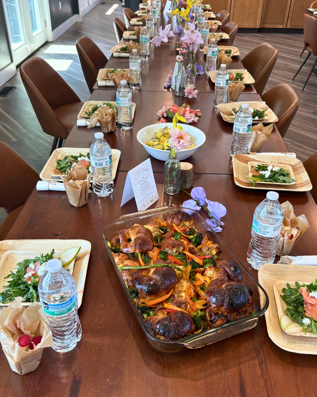 Woodhaven Recovery shared meal table prepared for families, residents, and staff during a community gathering.