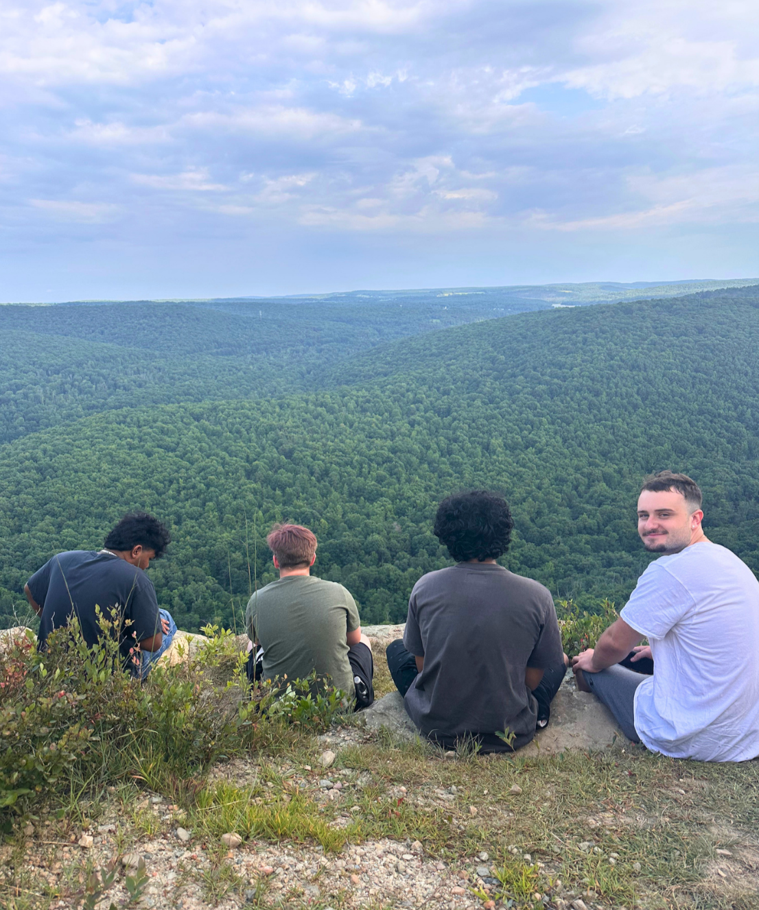 Woodhaven residents spending time together at a scenic mountain overlook