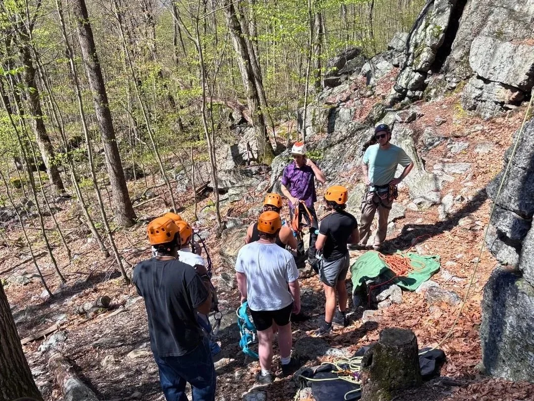 Woodhaven Recovery residents participating in an outdoor rock climbing experience as part of spring recreation programming.