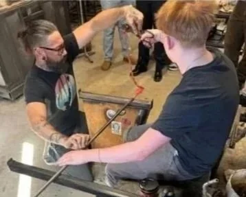 Woodhaven Recovery resident learns glassblowing during a hands-on career exploration experience, building confidence, focus, and exposure to future vocational pathways.