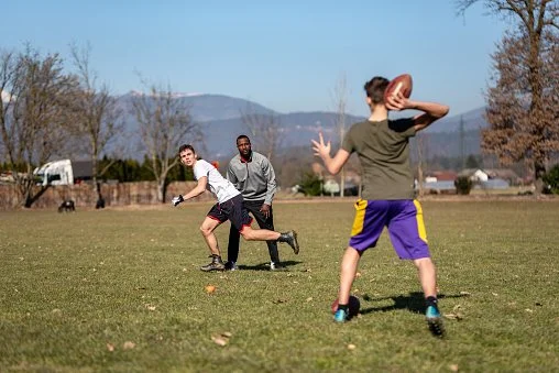 Residents enjoying team sports promoting physical fitness and camaraderie.