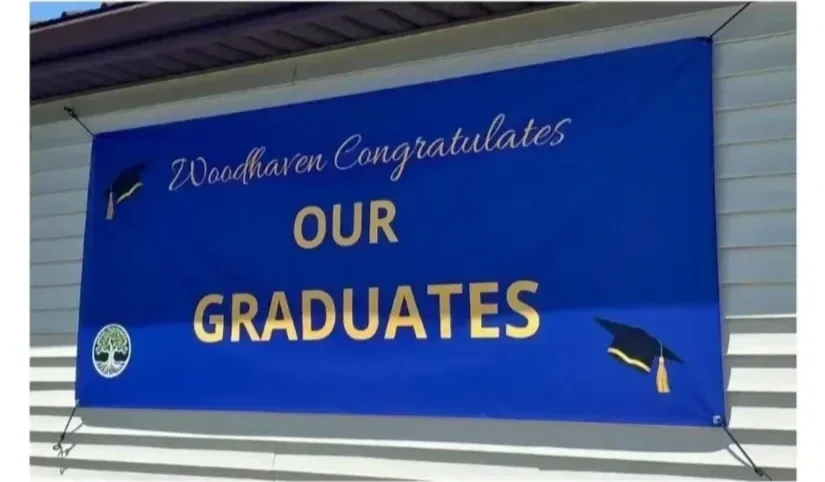 Woodhaven banner congratulating Woodhaven Prep graduates.