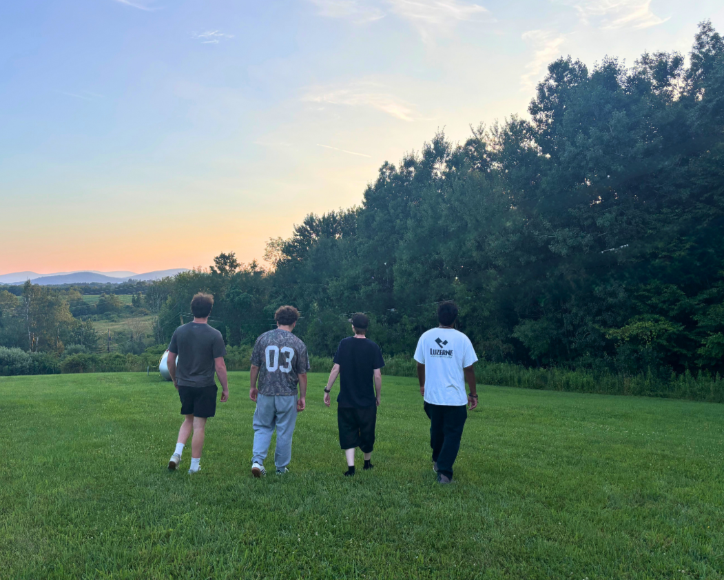 Woodhaven residents walking together outside on a summer evening