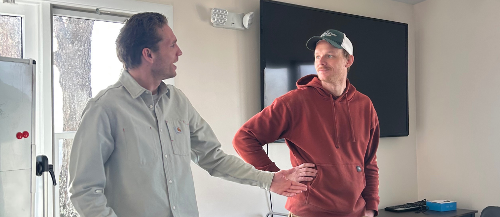 A guest speaker talks with Woodhaven Academy students during the Career Speaker Series.