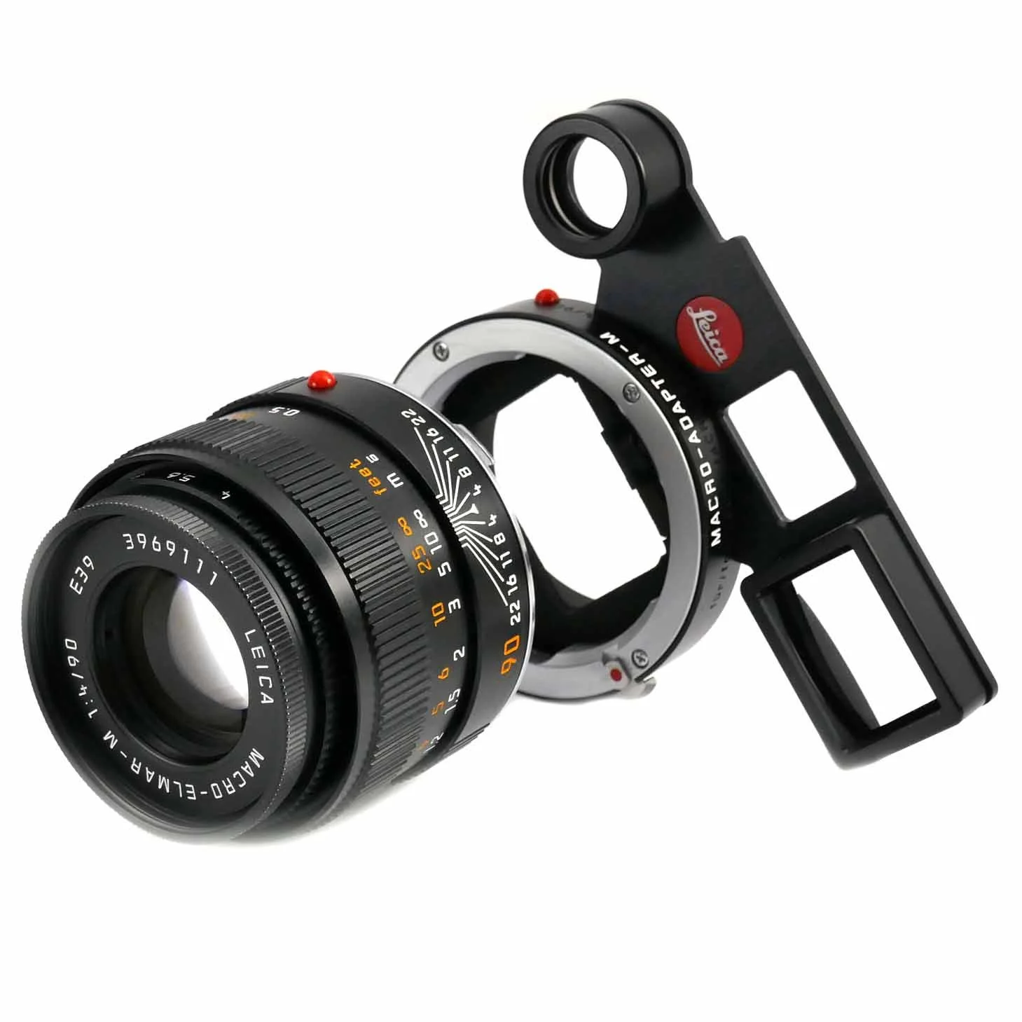 Leica Macro-Adapter with camera lens attached, designed for Leica cameras, black and silver metal construction with rings, markings, and red accents.