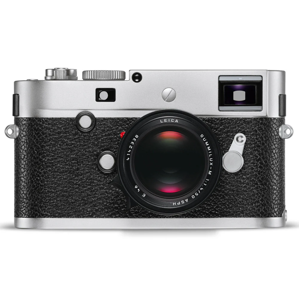 A vintage Leica camera with a silver top and black textured body, featuring a large lens in the center.