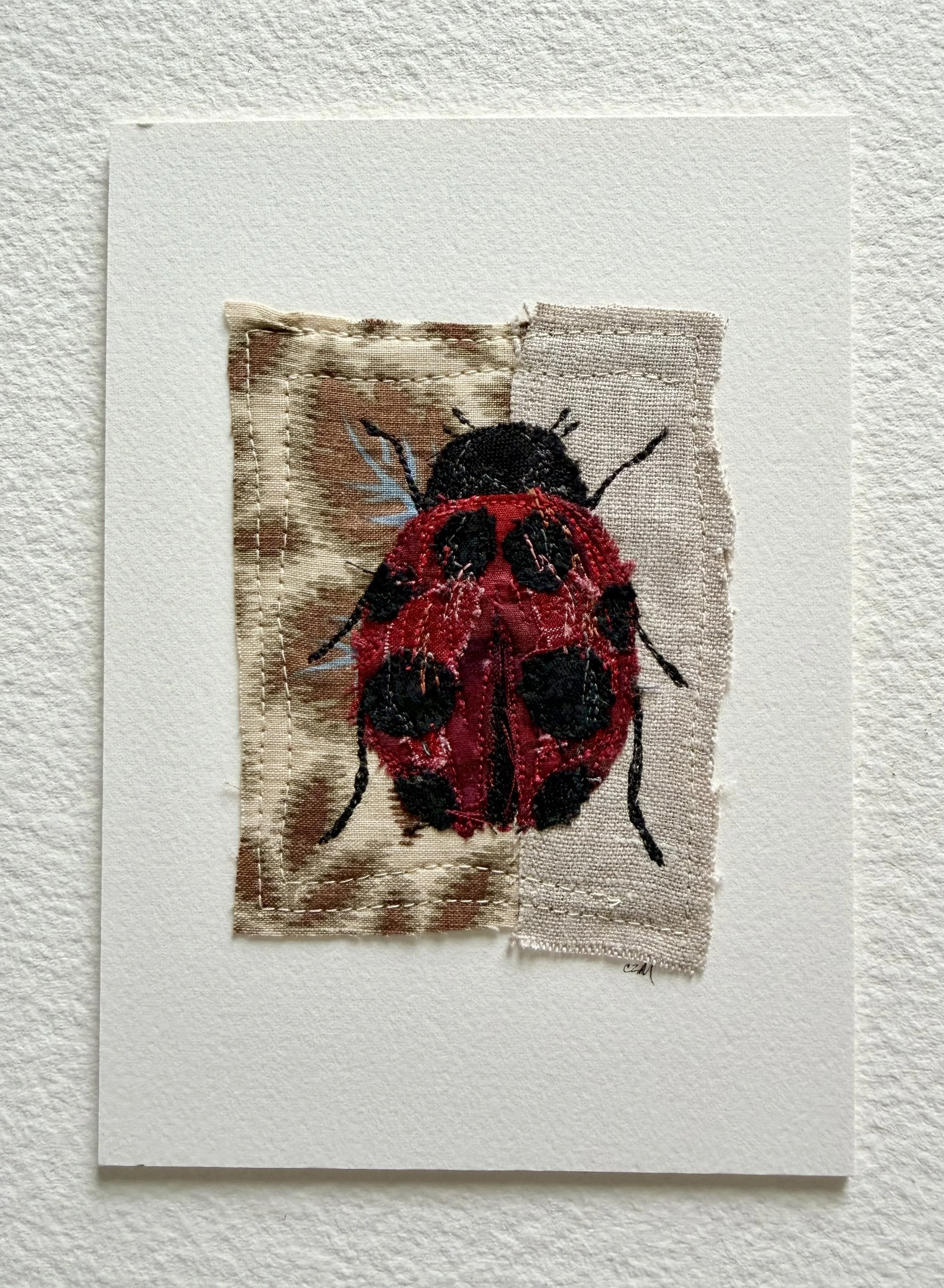 Lady Bug with Leaves - unframed textile collage