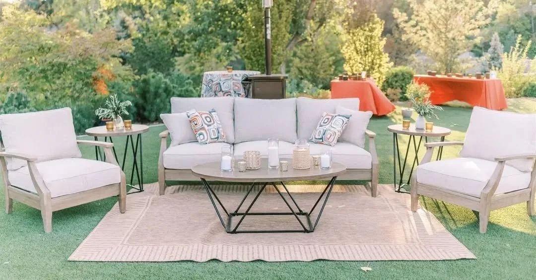 Stylish and elegant, the new Clare View Sofa and Chairs! The antique teak with beige cushions is oh so comfortable and neutral. And the added custom accent pillows give it a pop of personality.    
Planner/Design - @carriedayton
Catering -