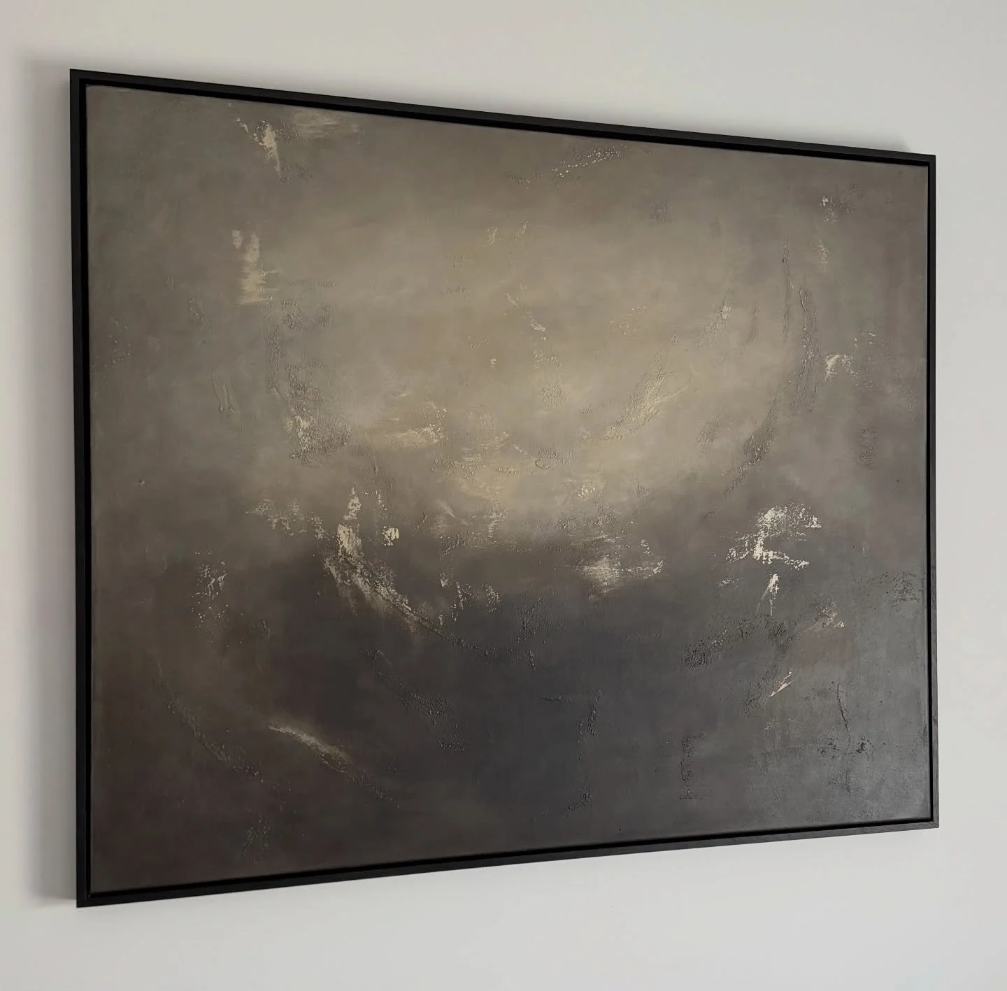 &ldquo;Fog at First Light&rdquo; - An atmospheric abstract painting that captures the moments night loosens its grip and morning has yet to fully arrive. Framed in a sleek black border, this piece brings understated elegance and calm to any modern in