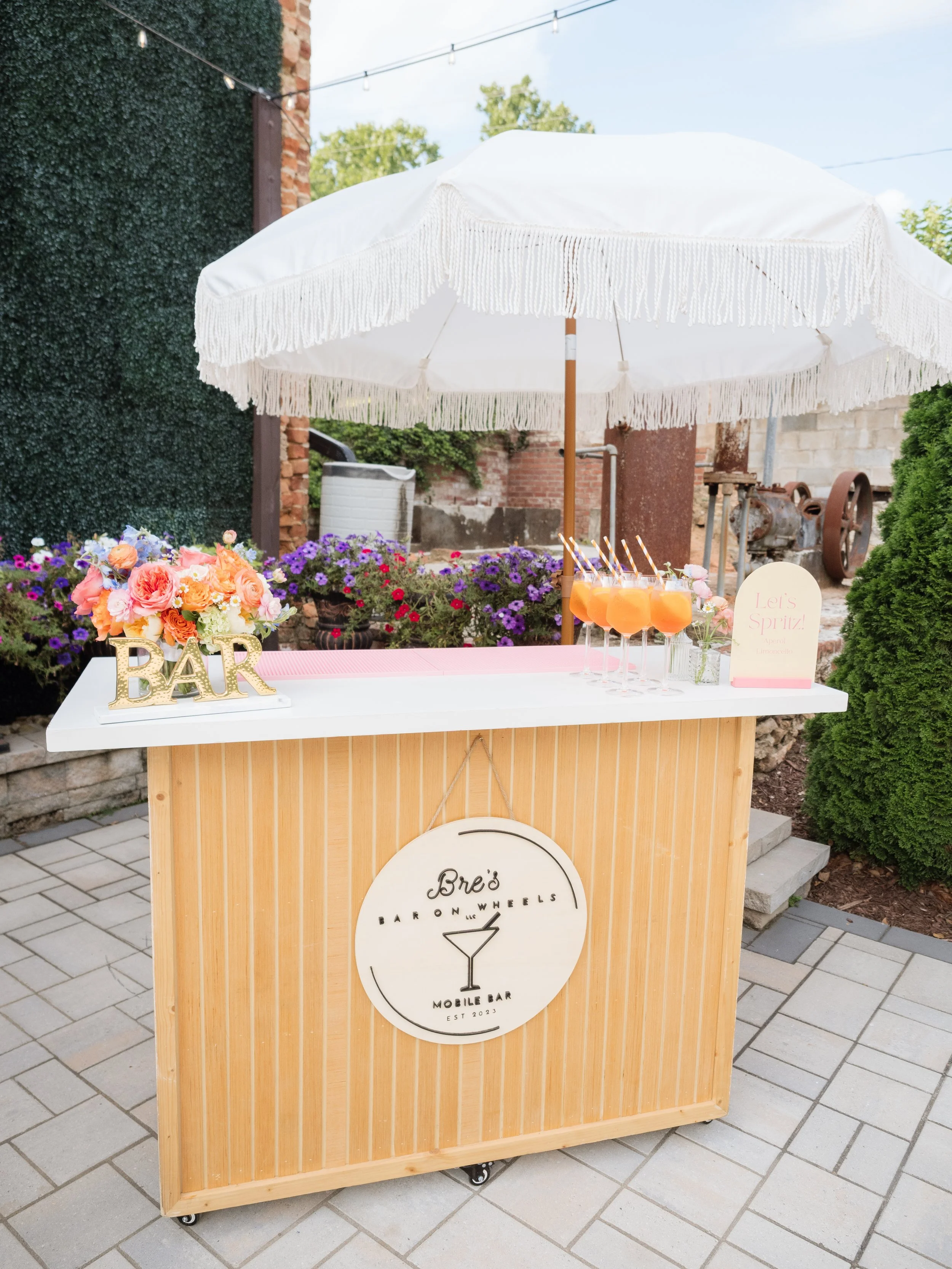 Bre's Bar on Wheels with flowers..jpg