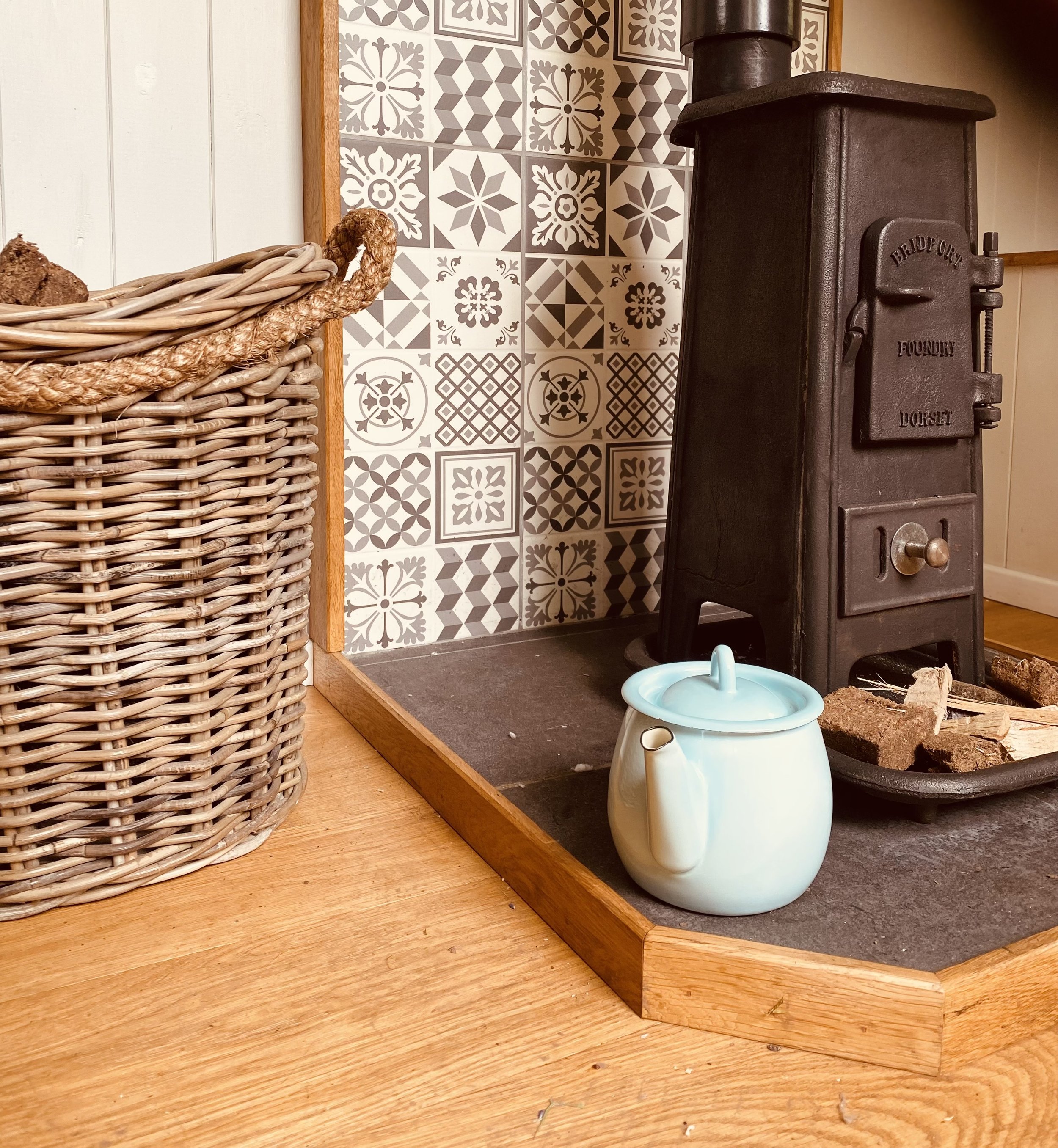 Stove with kettle and basket.jpg