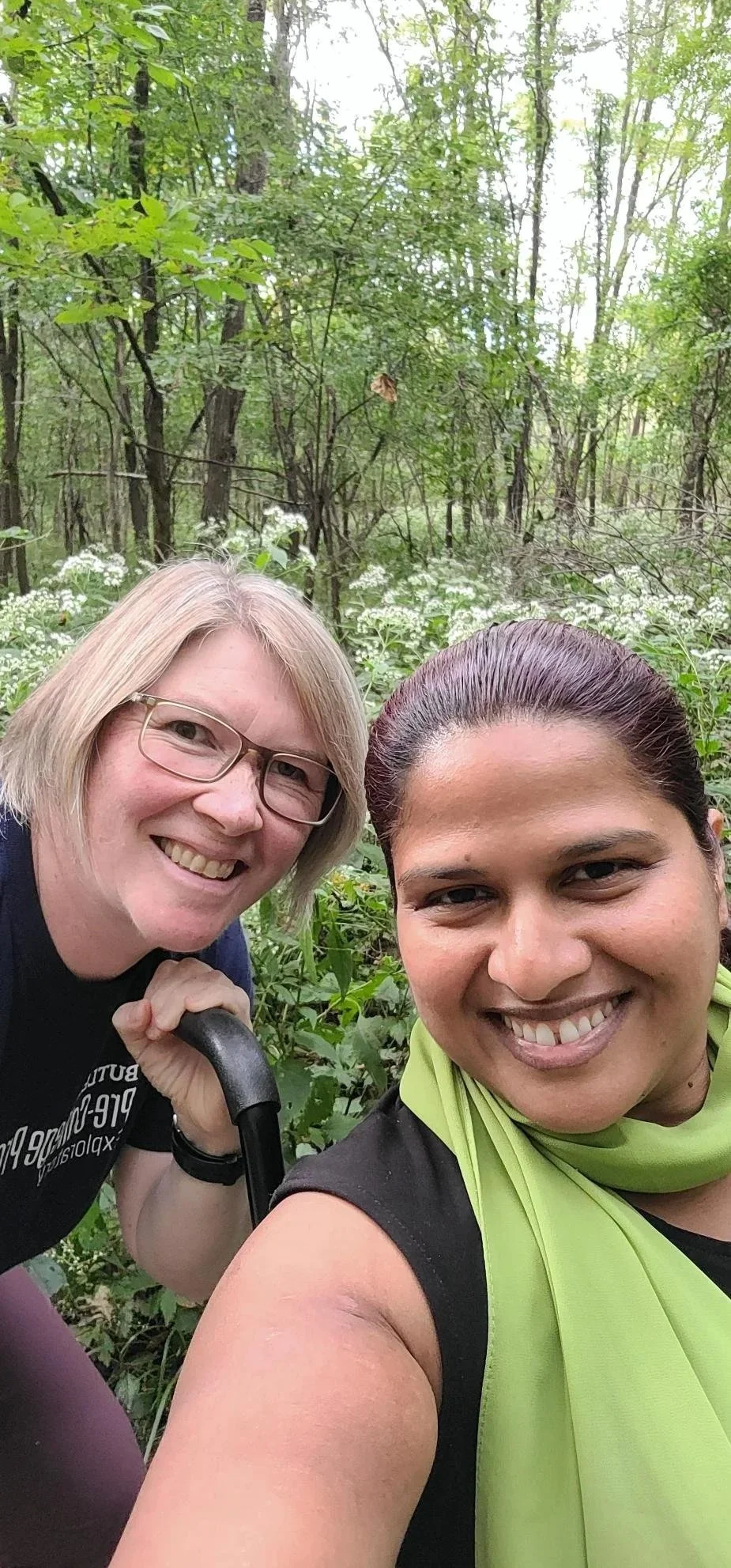 Selfie of Steph and Sheely in a forest