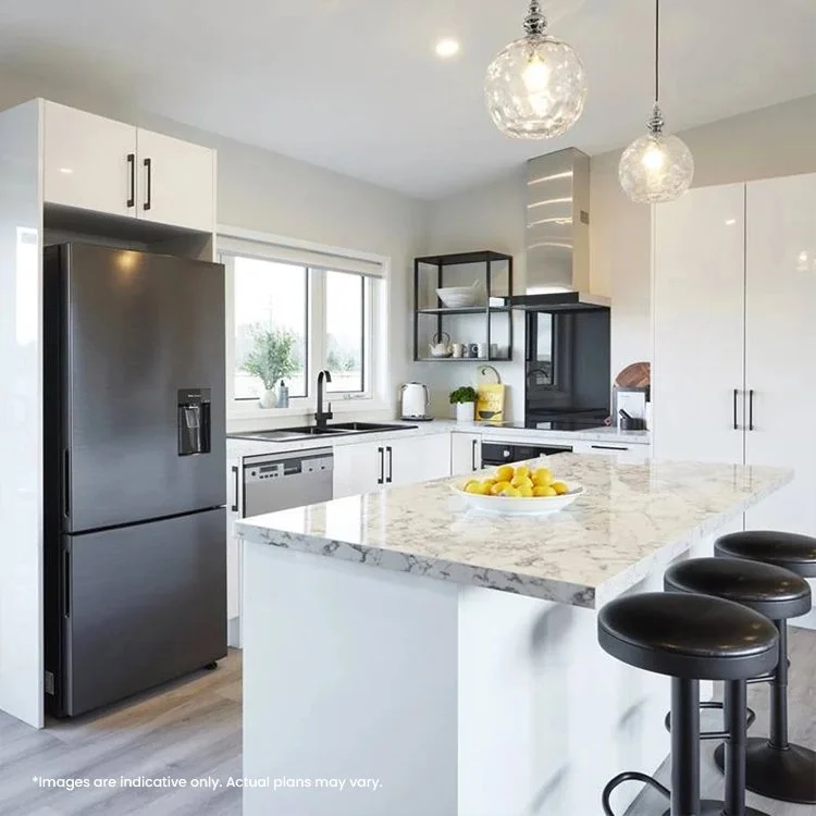 Modern kitchen interior with marble island, black stools, stainless steel refrigerator, white cabinetry, pendant lighting, and decorative items on shelves.