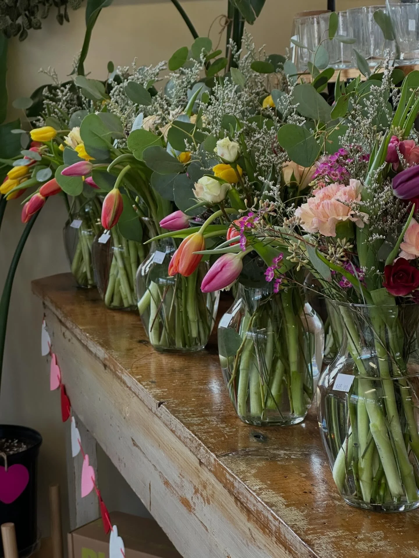 The Shop is filled with flowers today! 

If you preordered, your Val Day bouquets are now ready for pickup. If you *didn&rsquo;t* preorder, worry not: all of the bouquets on this table are fair game! First come first serve, while supplies last. 🫶

T