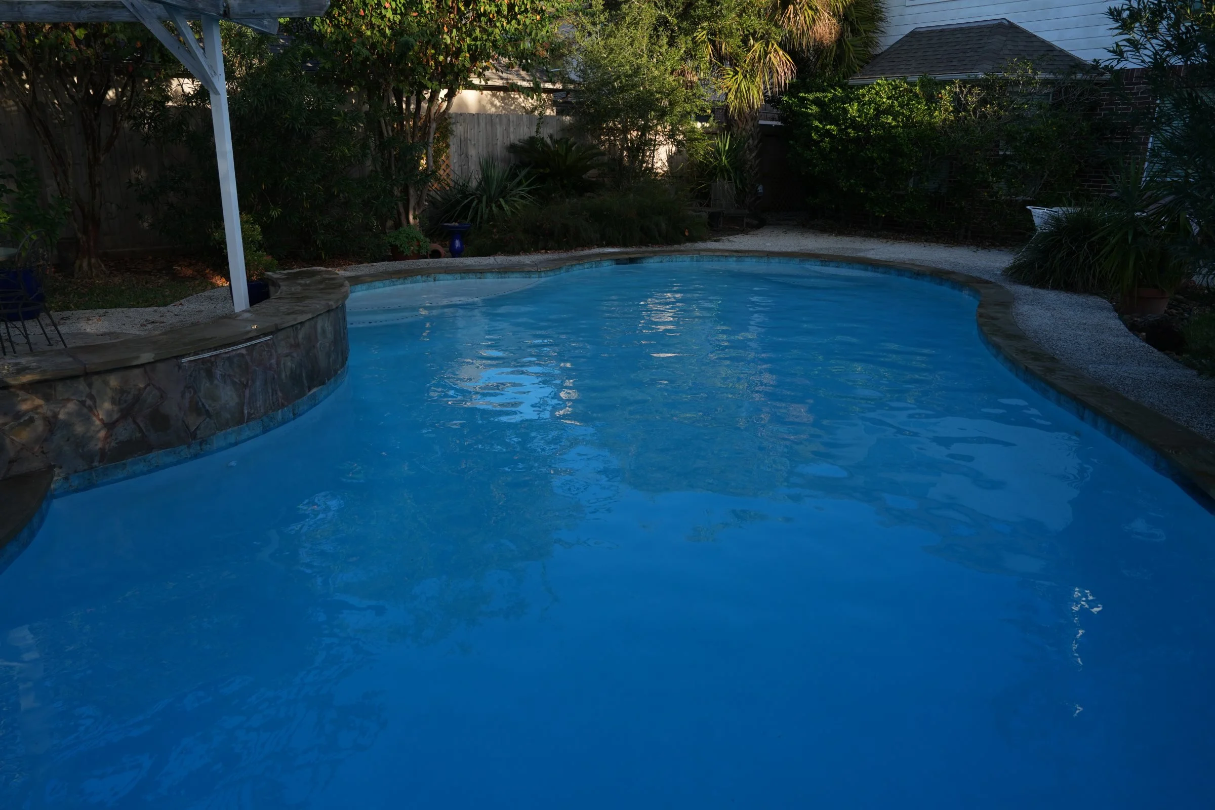 South Shore Harbor pool with renewed coping and blue waterline details.