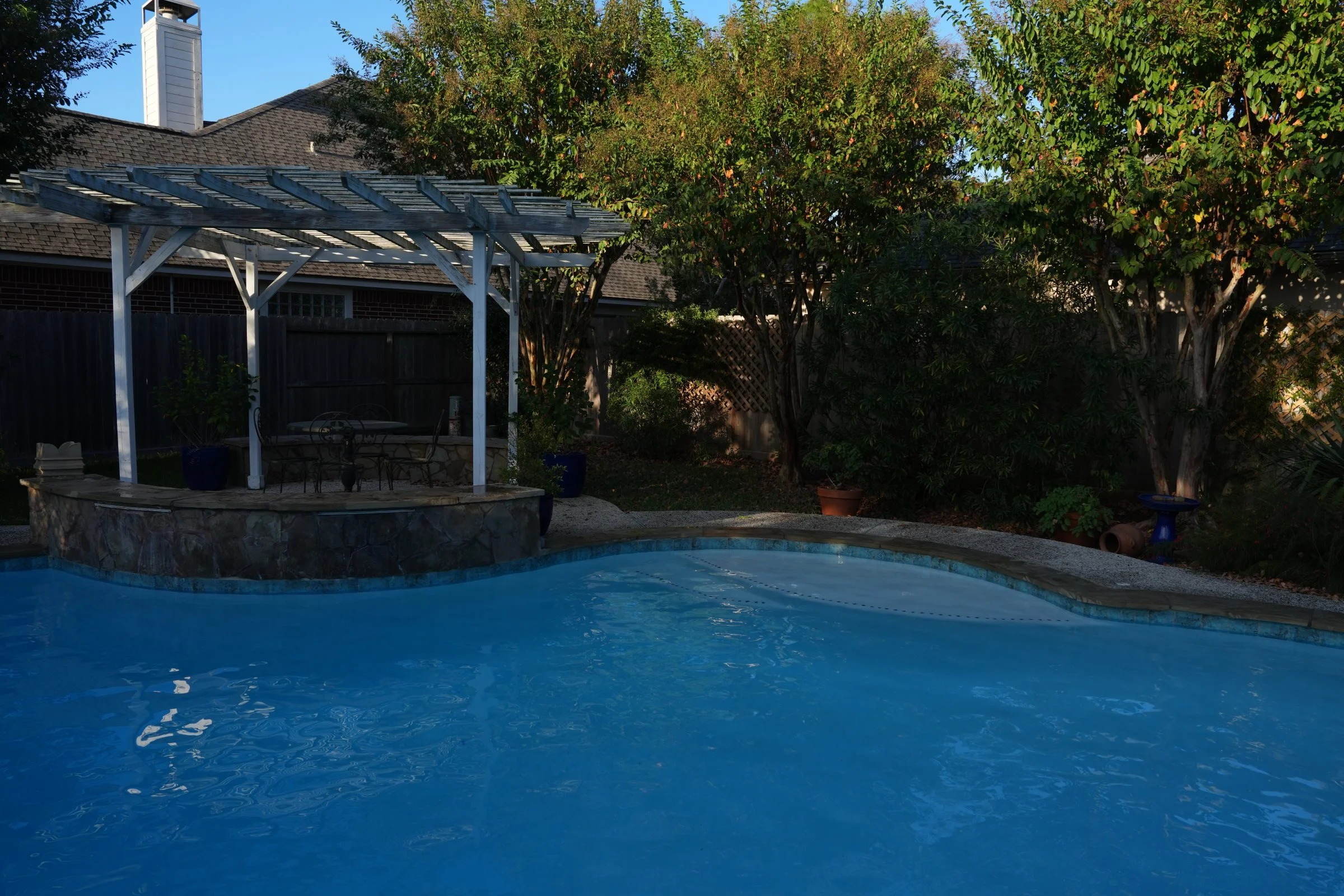 South Shore Harbor pool refresh showing white plaster and updated waterline tile.