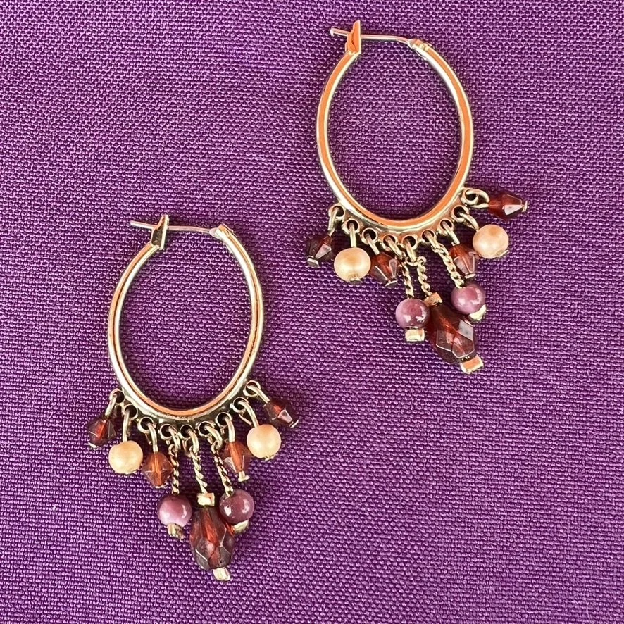 Oval hoop earrings with dangling beads