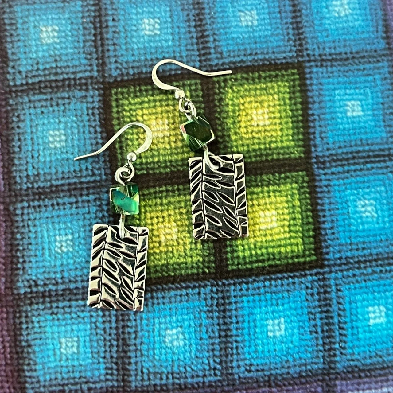 Botanical beaded silver tone earrings