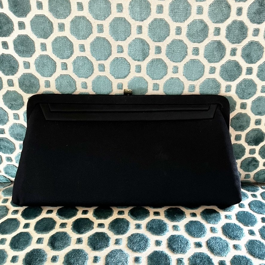 Black convertible clutch from the 1950s