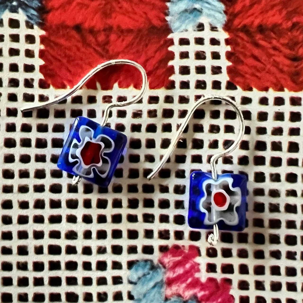 Small floral beaded earrings on hand-formed wires